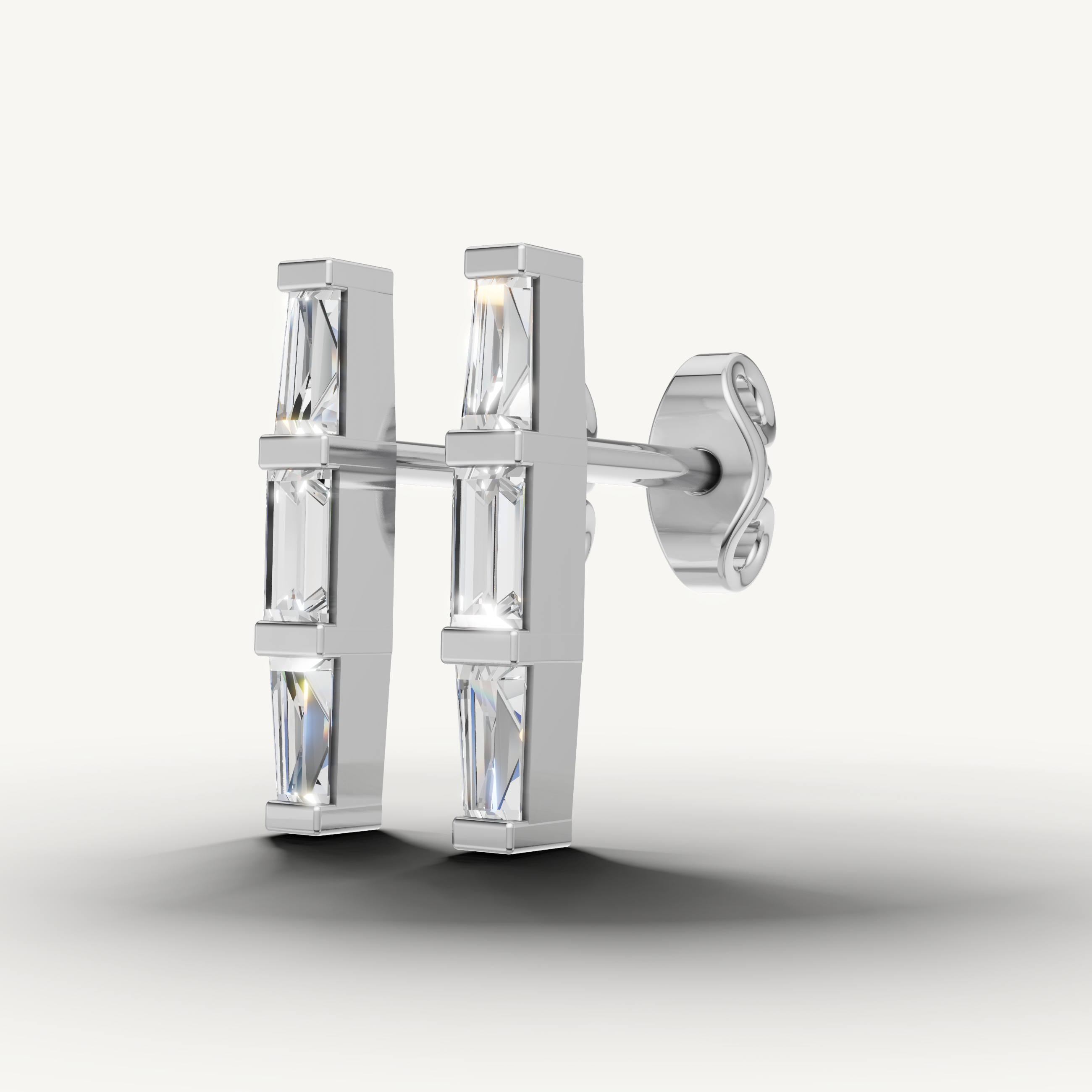 Luxury white gold geometric baguette diamond earrings with contemporary sparkle by Raul Diamonds