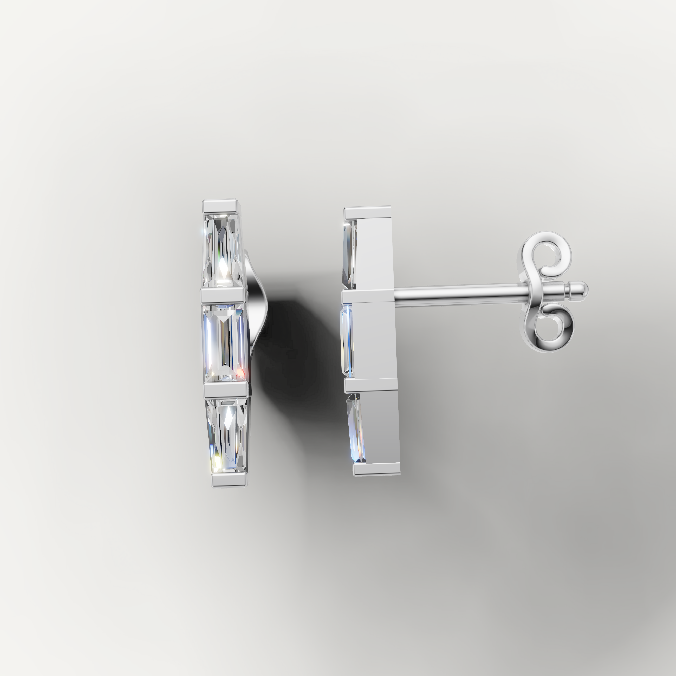 White gold vertical baguette diamond earrings by Raul Diamonds with sleek luxury design