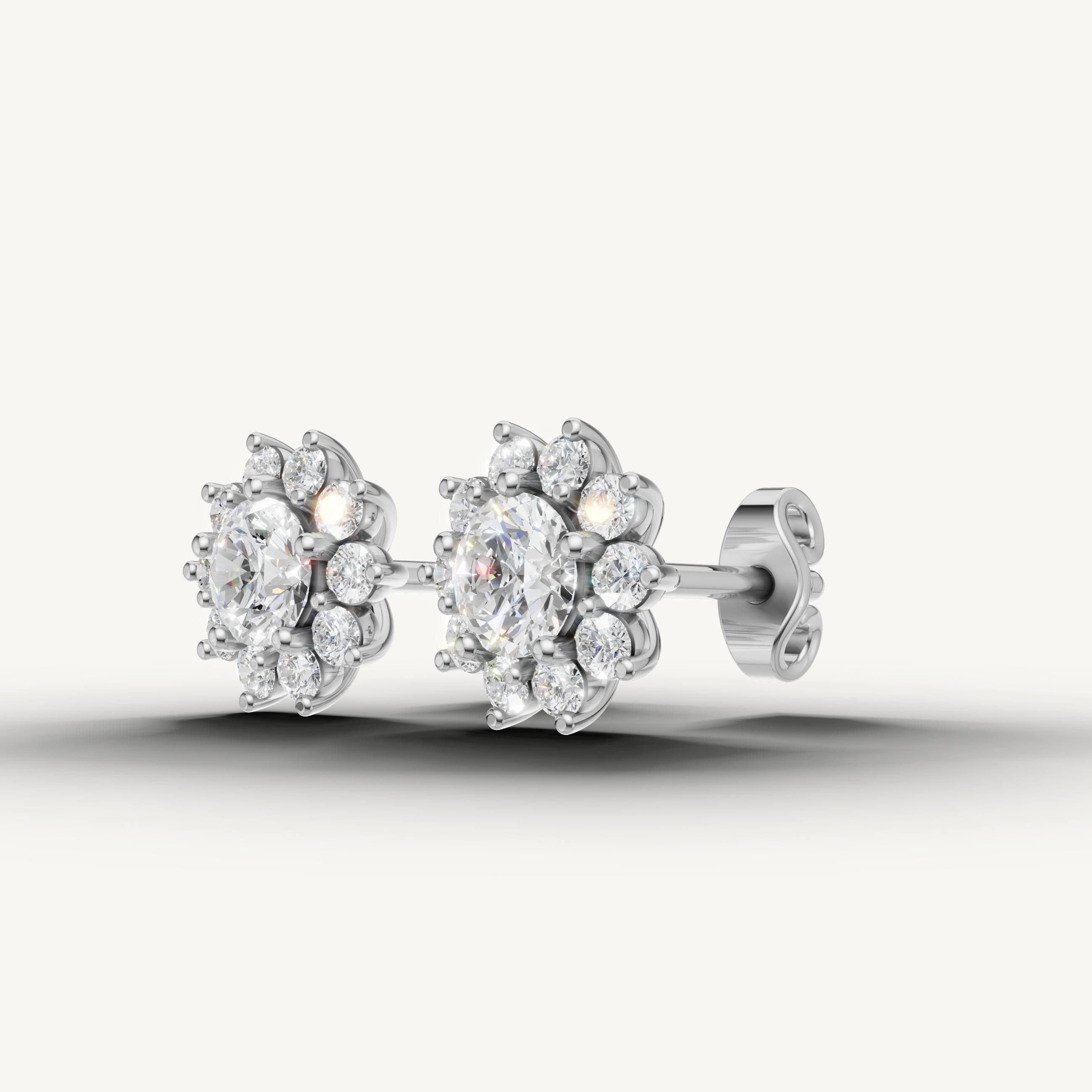 Elegant white gold floral halo diamond earrings with radiant brilliance by Raul Diamonds