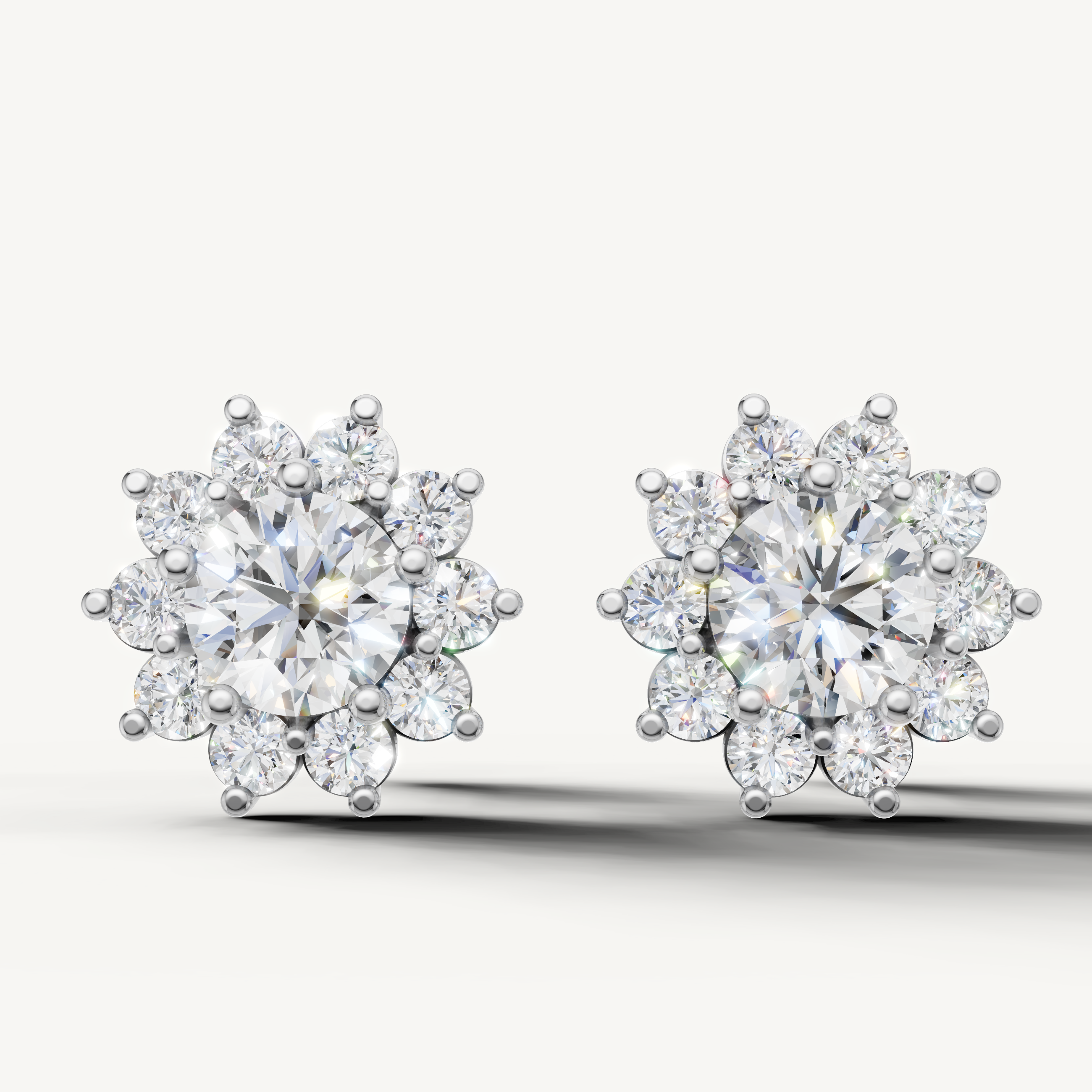 Floral halo lab grown diamond stud earrings in 14K white gold by Raul Diamonds