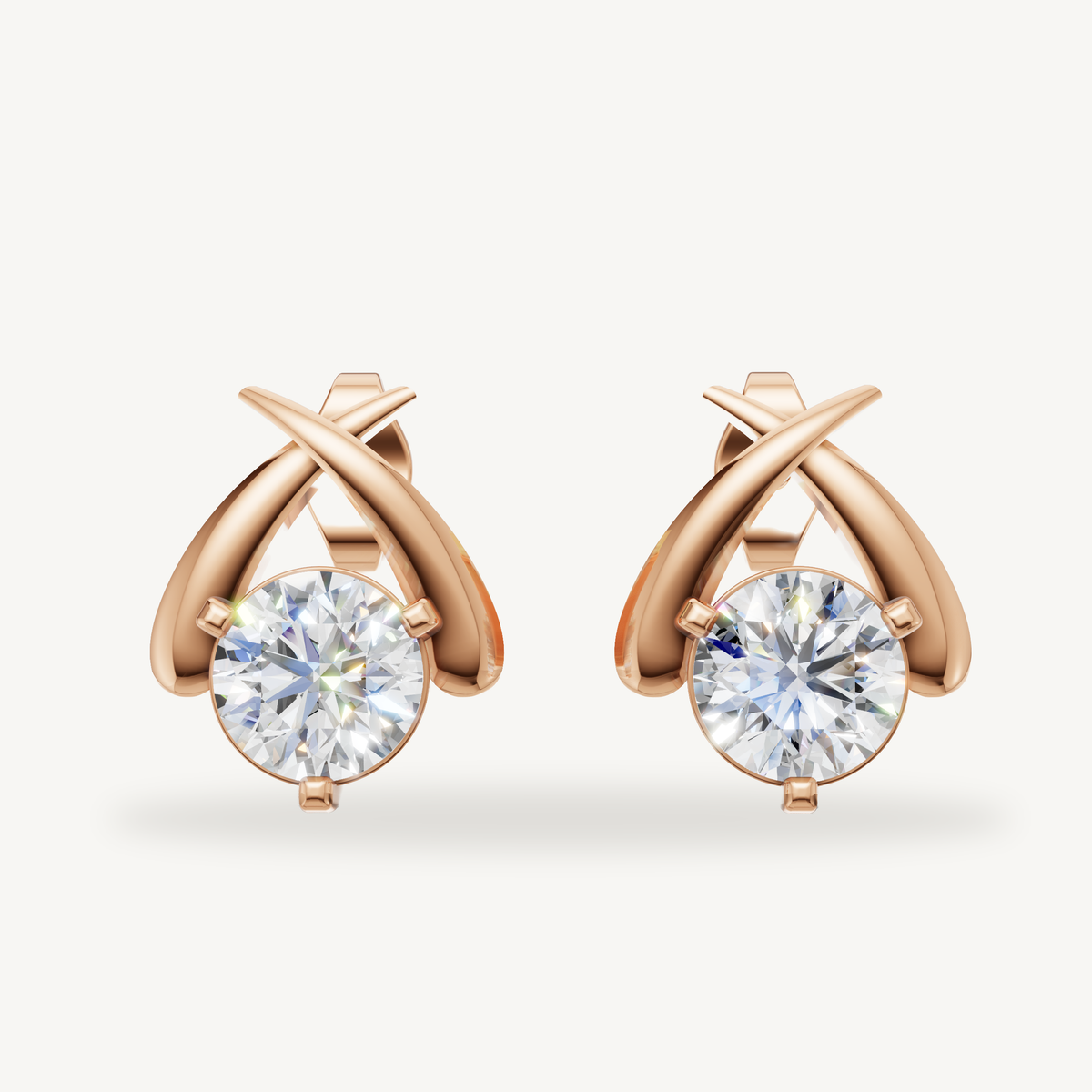 Rose gold round diamond crossover earrings by Raul Diamonds with luxury sparkle