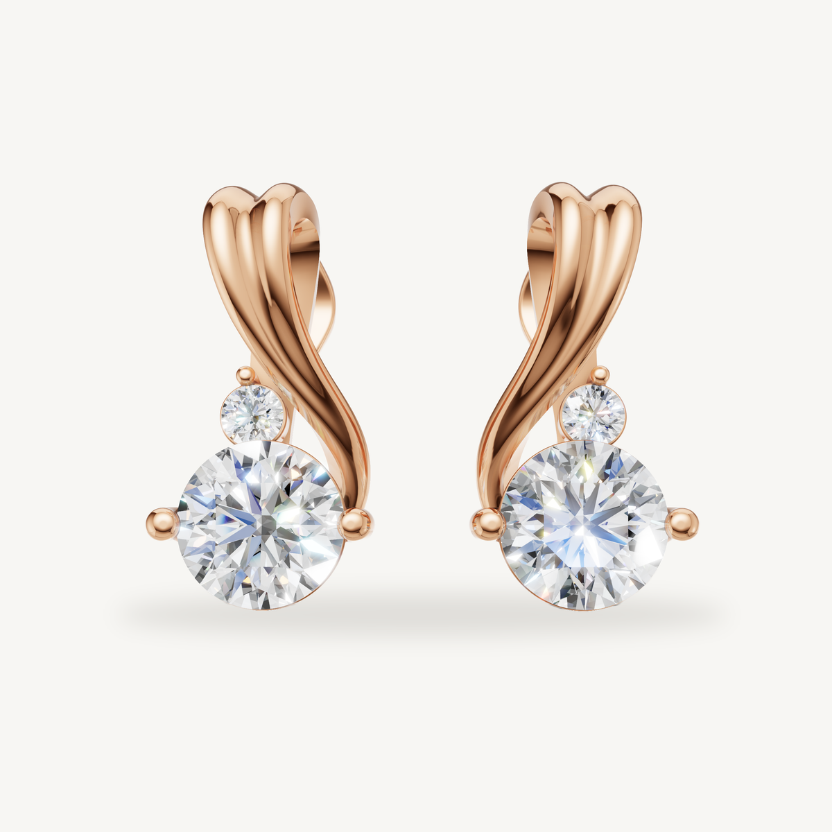 Twisted drop lab grown diamond earrings in 14K rose gold by Raul Diamonds