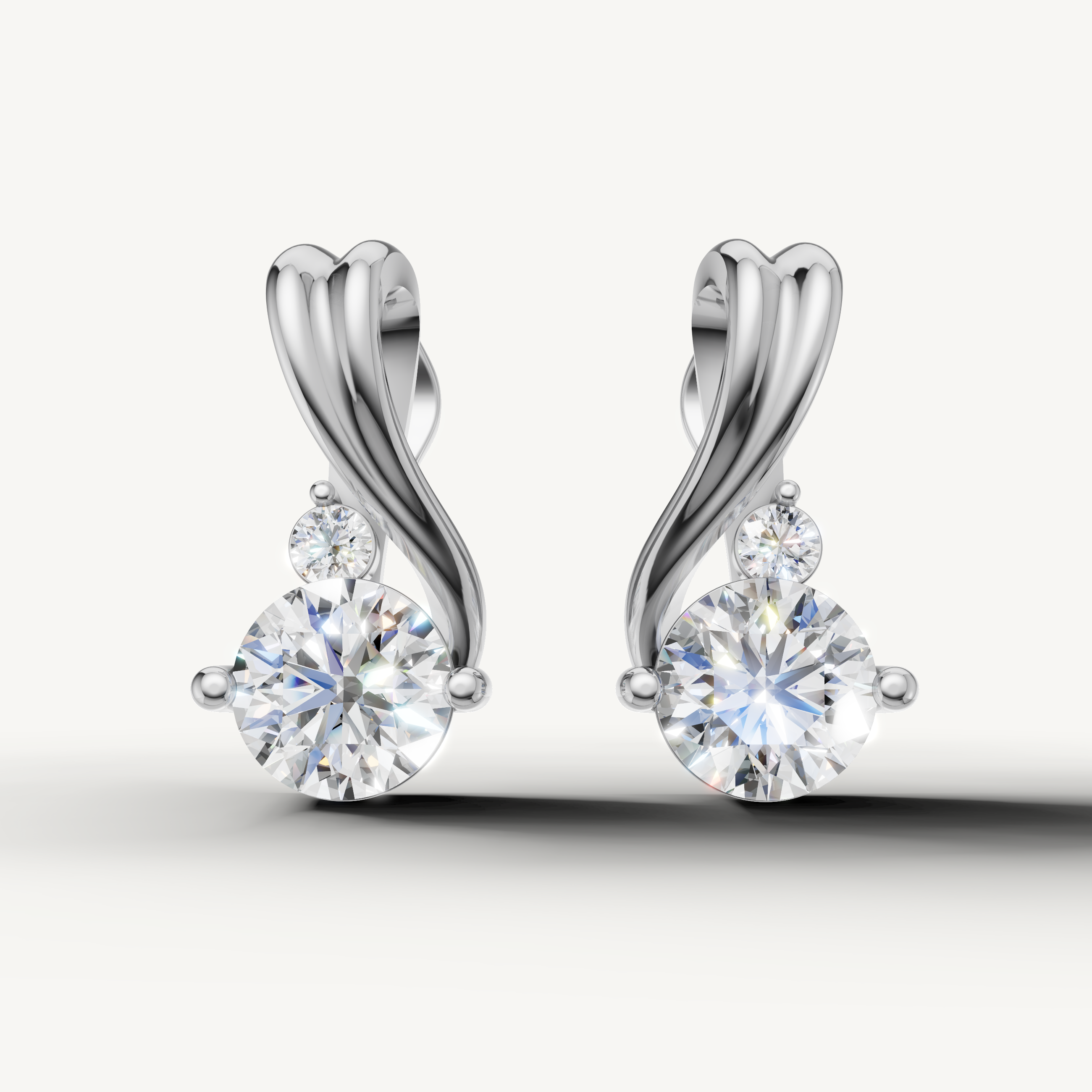 Twisted drop lab grown diamond earrings in 14K white gold by Raul Diamonds