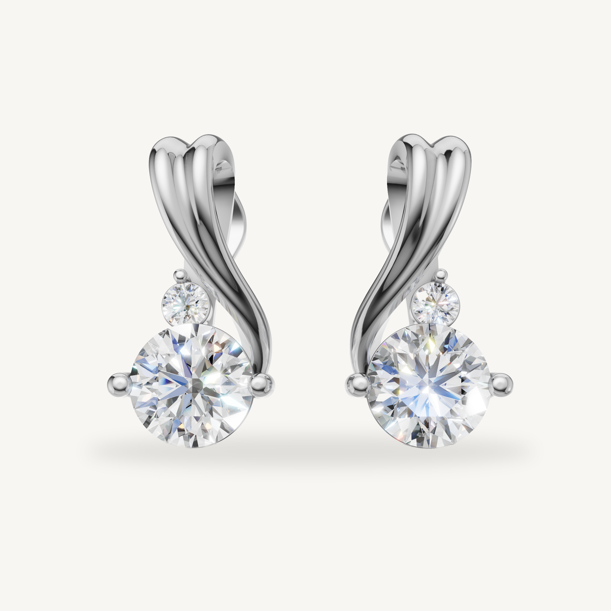 Twisted drop lab grown diamond earrings in 14K white gold by Raul Diamonds