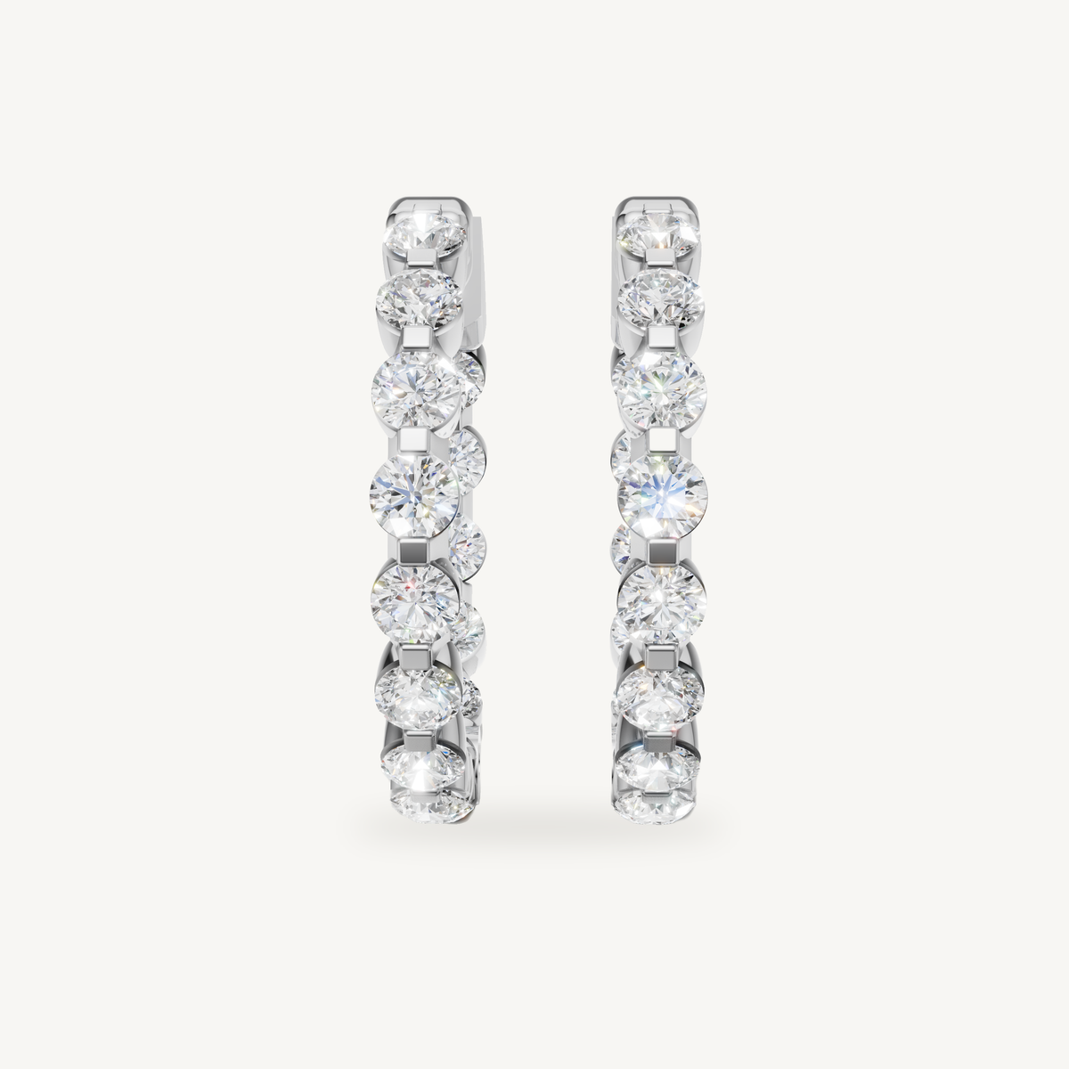 Raul Diamonds white gold diamond hoop earrings with round brilliant diamonds
