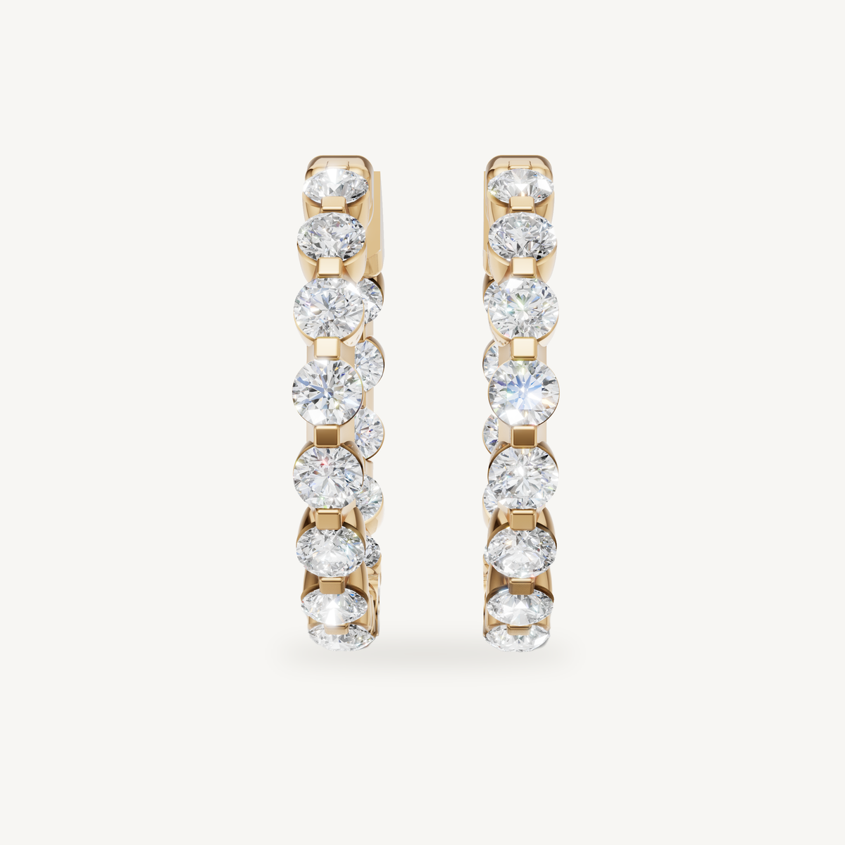 Raul Diamonds yellow gold diamond hoop earrings with round brilliant stones