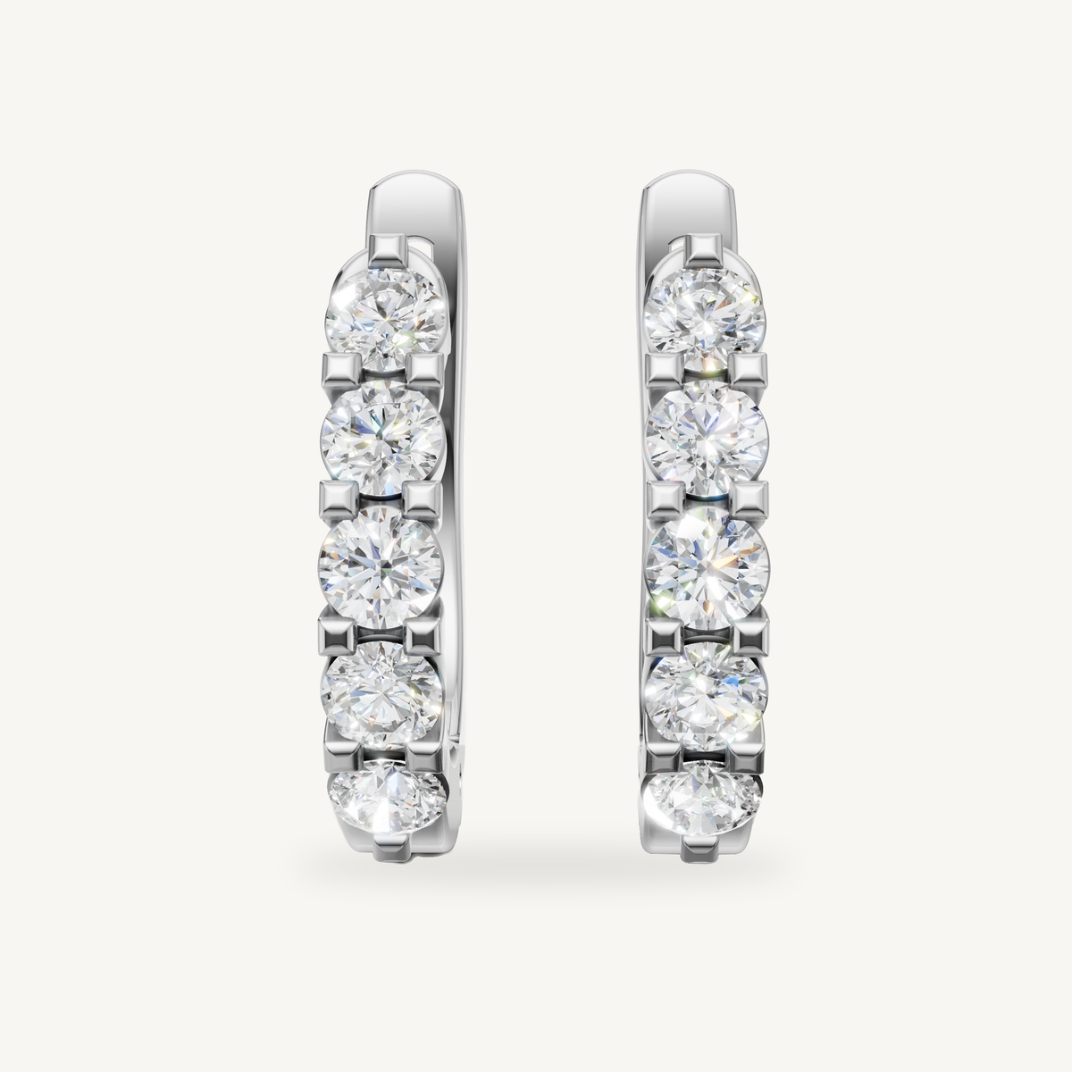 Raul Diamonds white gold diamond hoop earrings with round brilliant diamonds