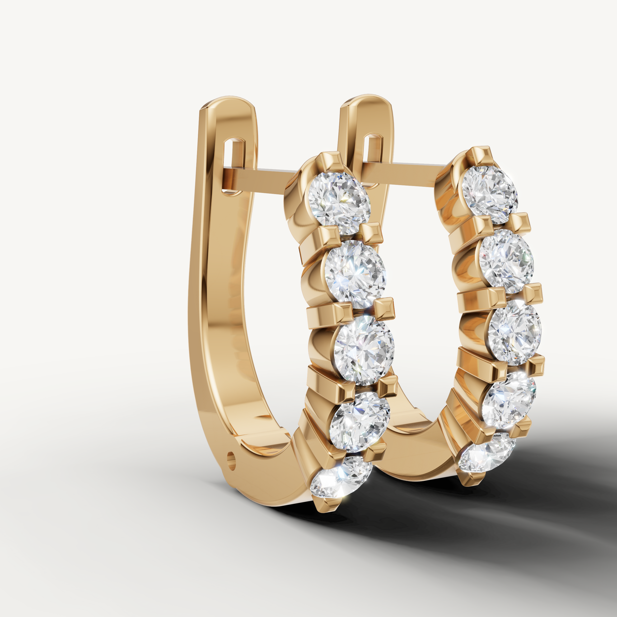 Yellow gold round diamond hoop earrings by Raul Diamonds with elegant sparkle