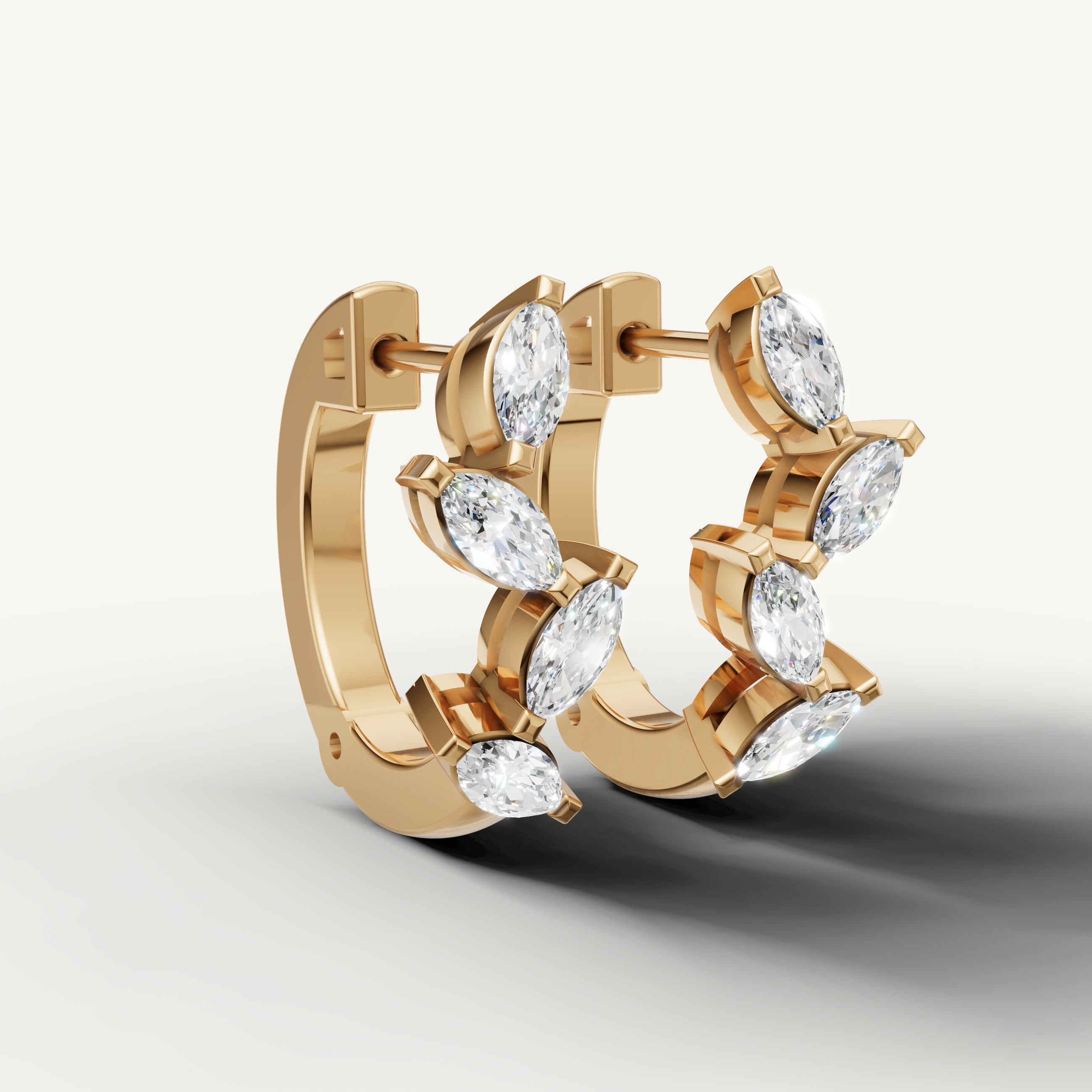 Yellow gold marquise cut diamond earrings by Raul Diamonds with luxury sparkle