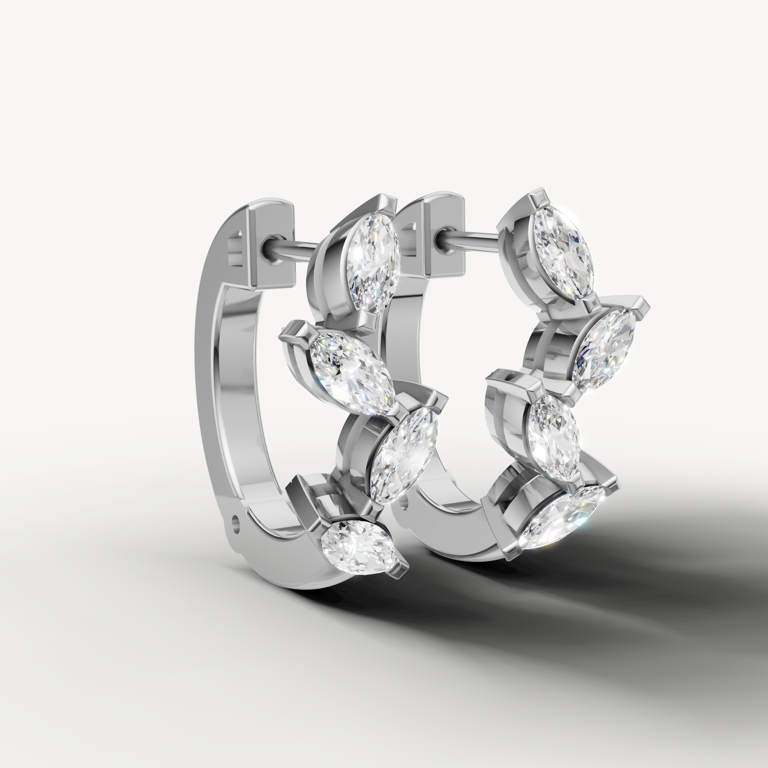 White gold marquise cut diamond earrings by Raul Diamonds with luxury elegance