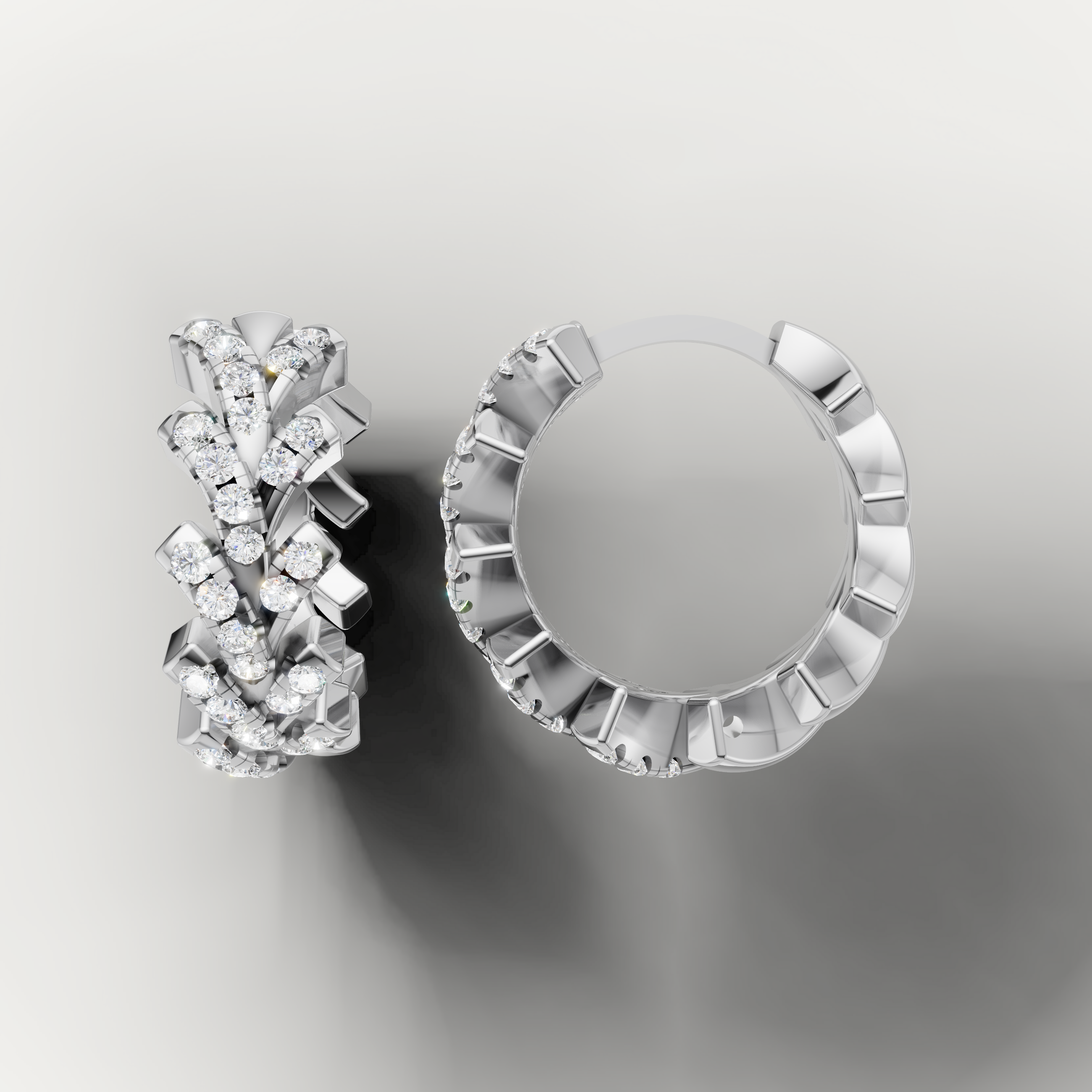 Handmade white gold diamond earrings for women by Raul Diamonds