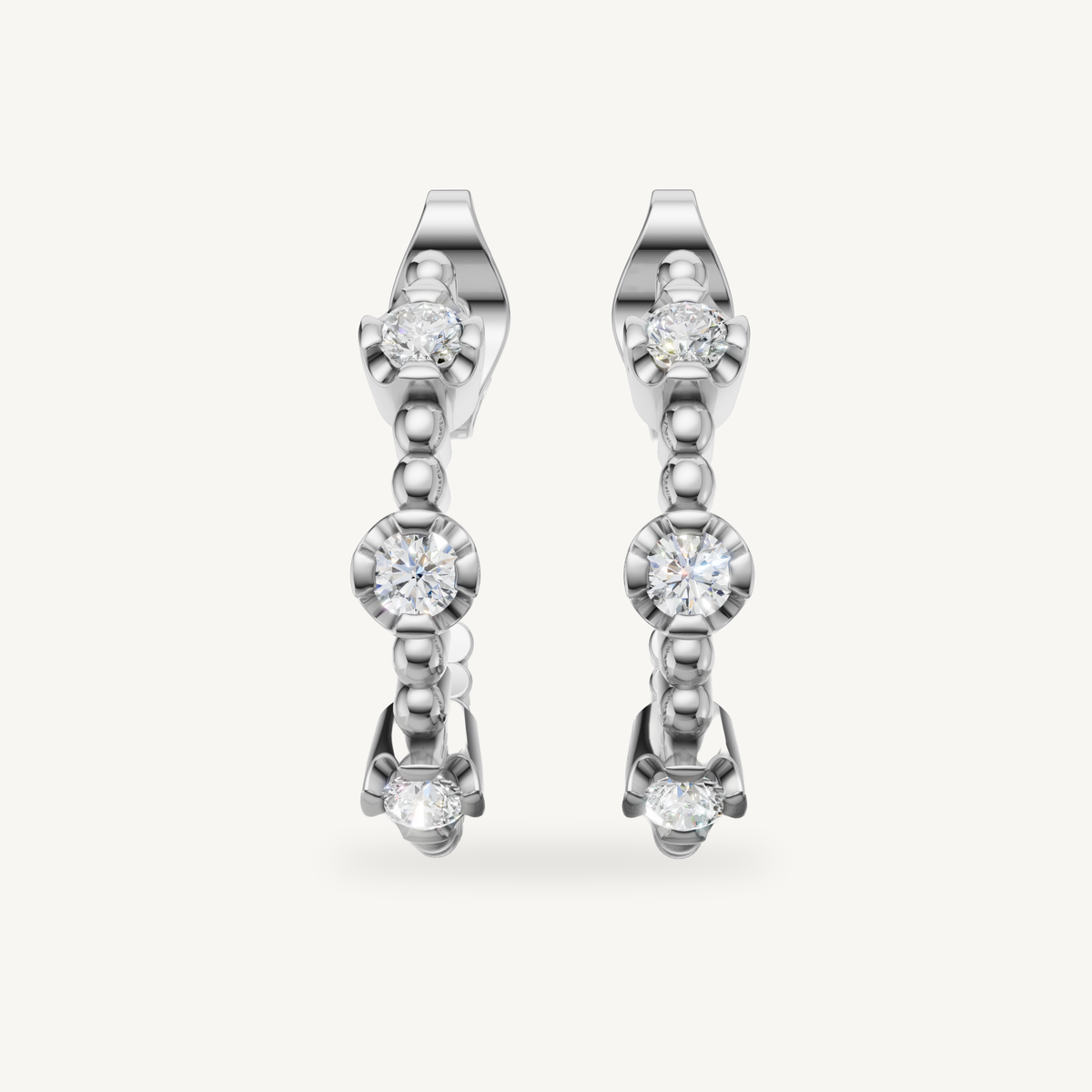 Luxury white gold drop earrings with bezel set diamond accents