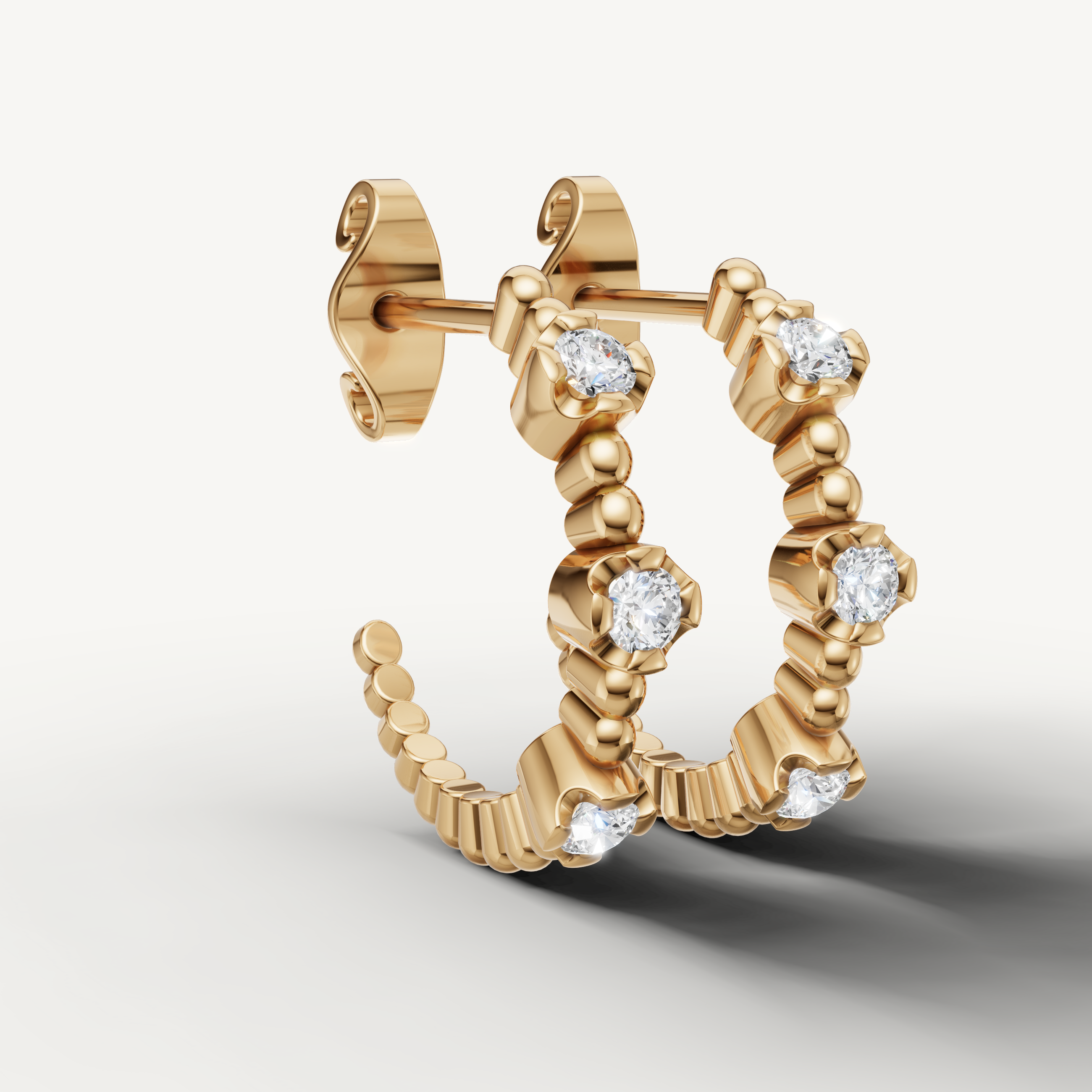 Luxury yellow gold beaded diamond earrings with modern hoop styling