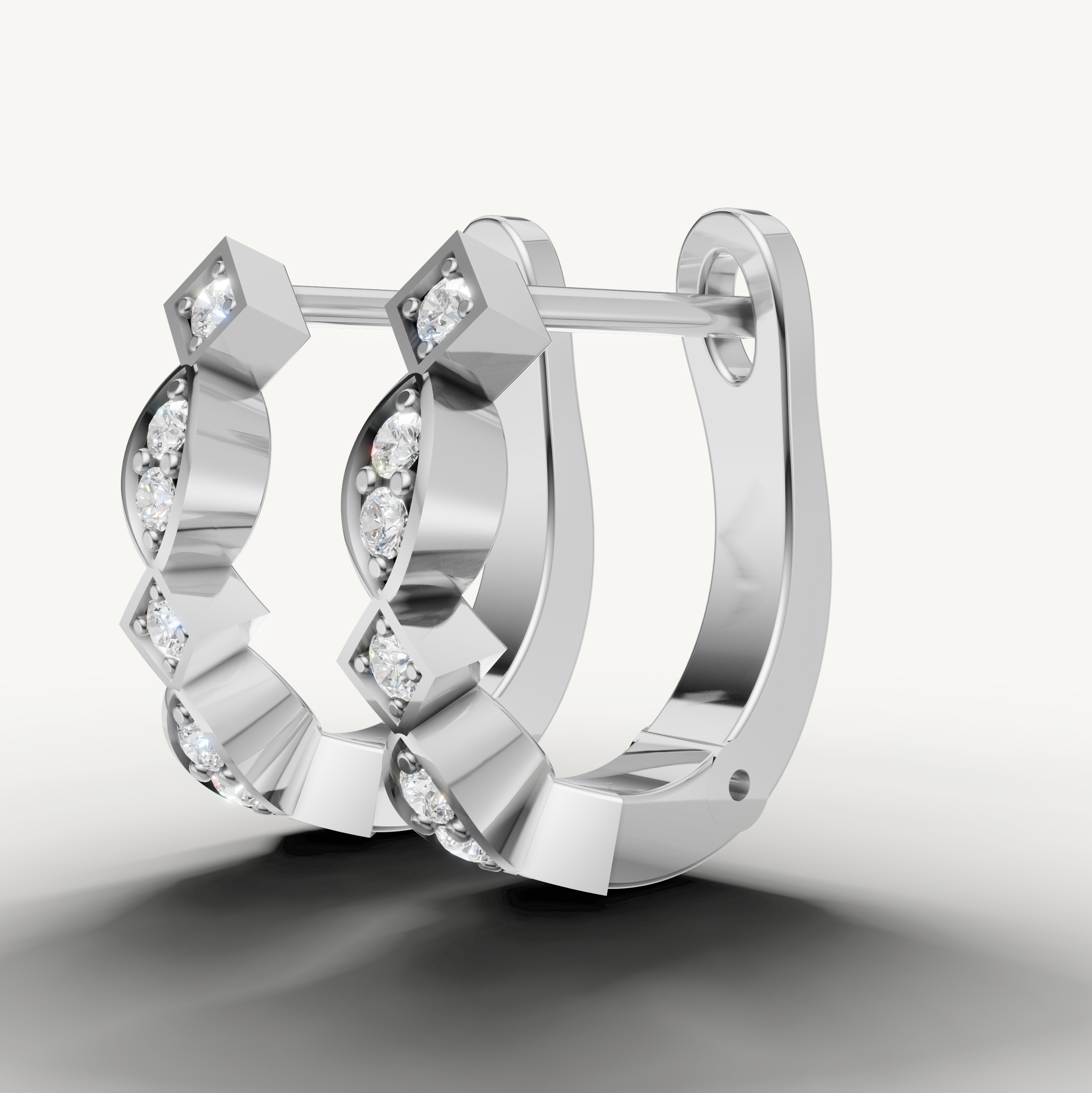 White gold designer diamond earrings by Raul Diamonds