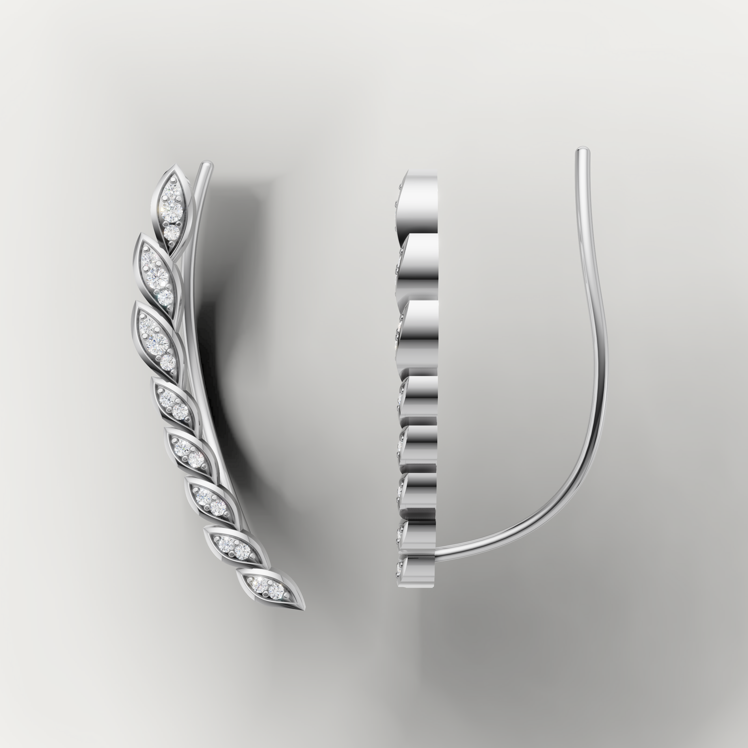 Elegant white gold nature inspired diamond earrings by Raul Diamonds