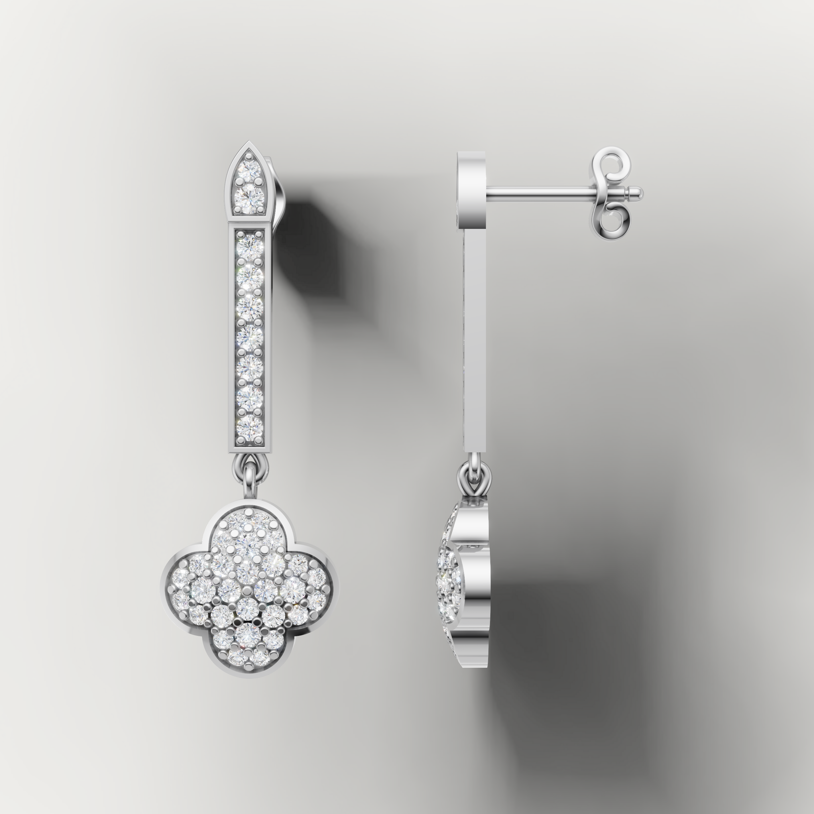 Elegant white gold floral diamond earrings by Raul Diamonds