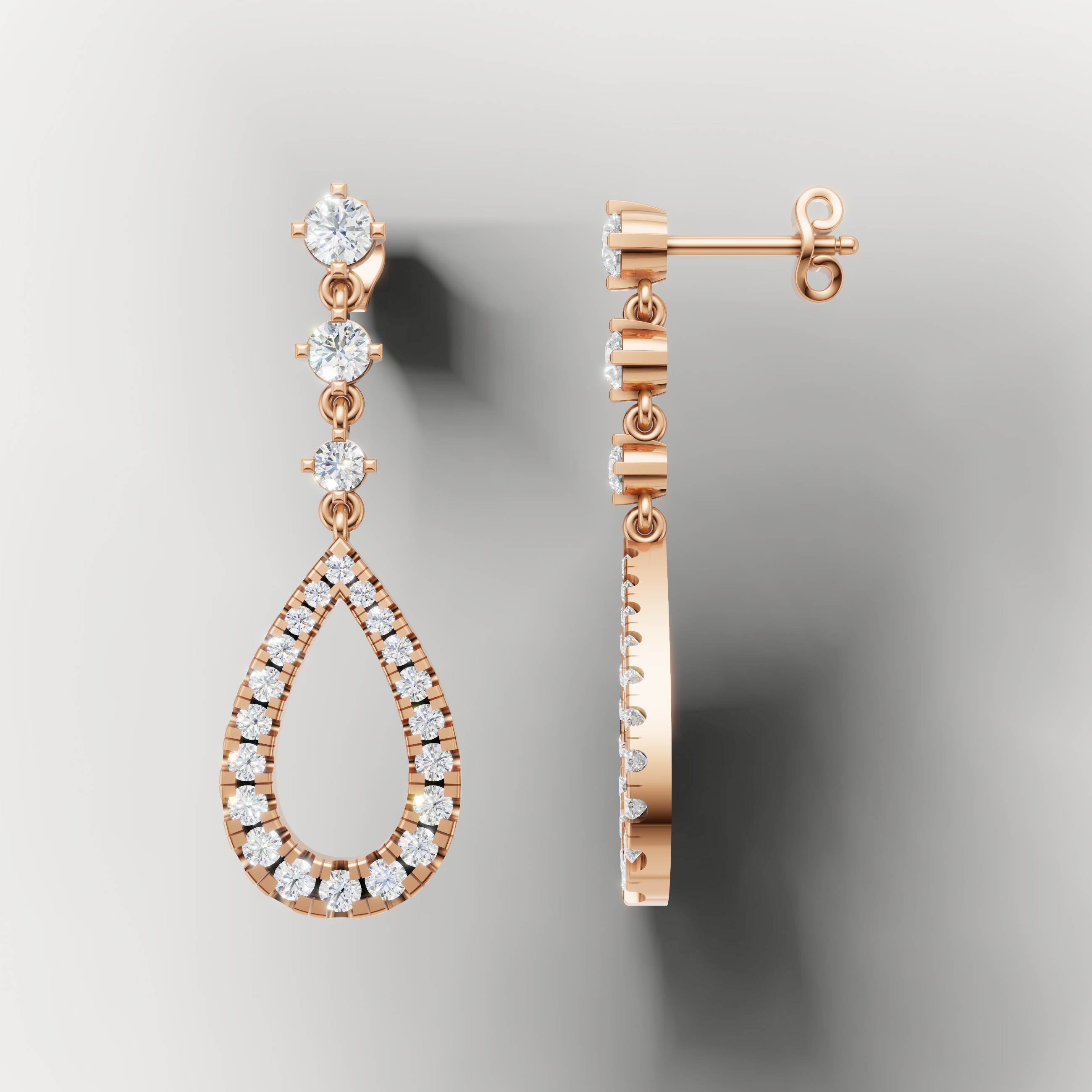 Elegant rose gold pear shape diamond drop earrings by Raul Diamonds