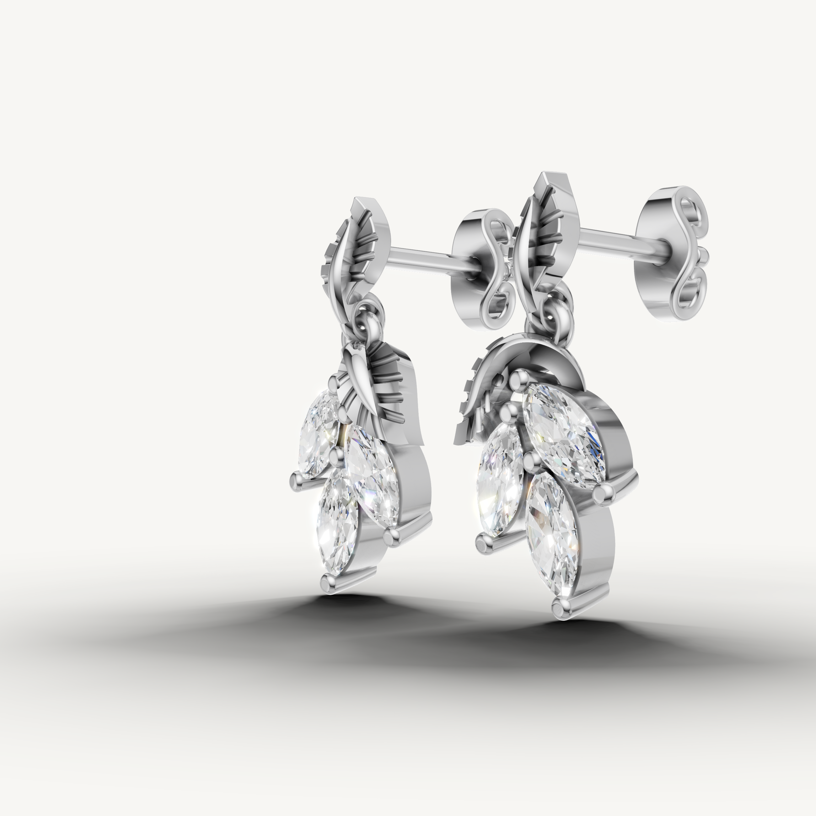 White gold dangling marquise diamond earrings handcrafted by Raul Diamonds
