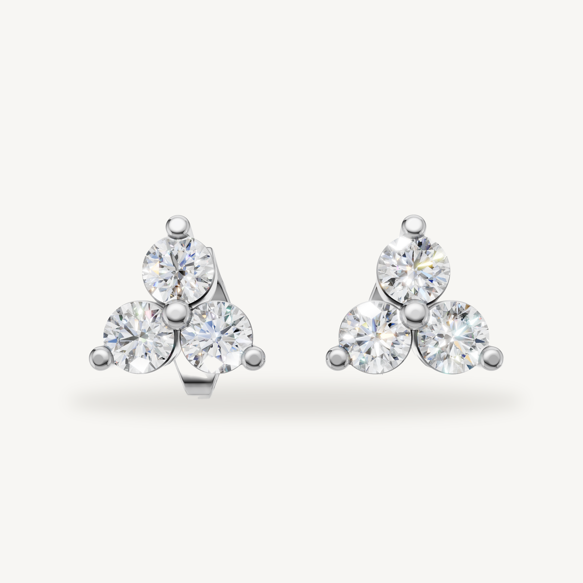 Raul Diamonds white gold three stone diamond stud earrings elegant fine jewelry