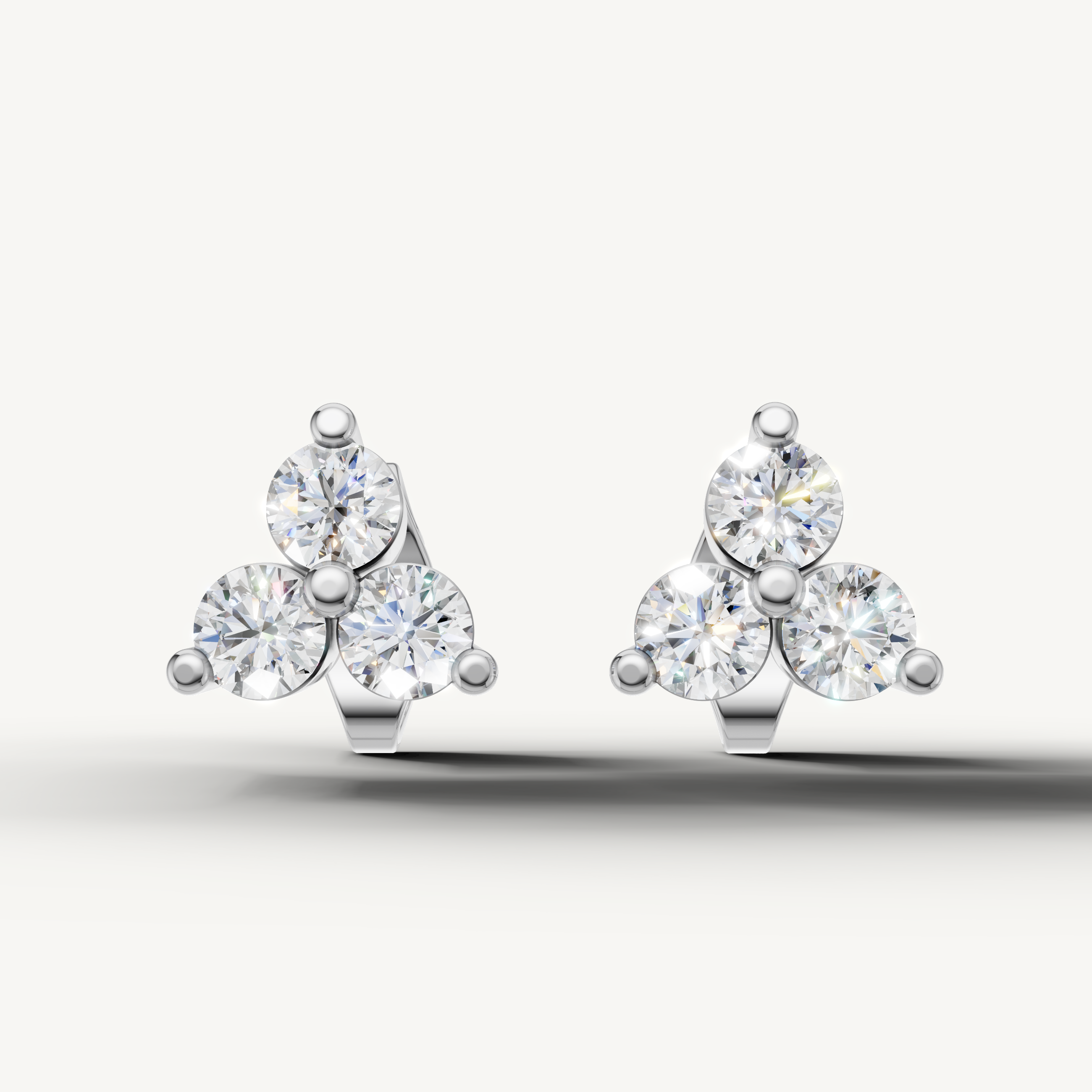 Raul Diamonds white gold three stone diamond stud earrings elegant fine jewelry