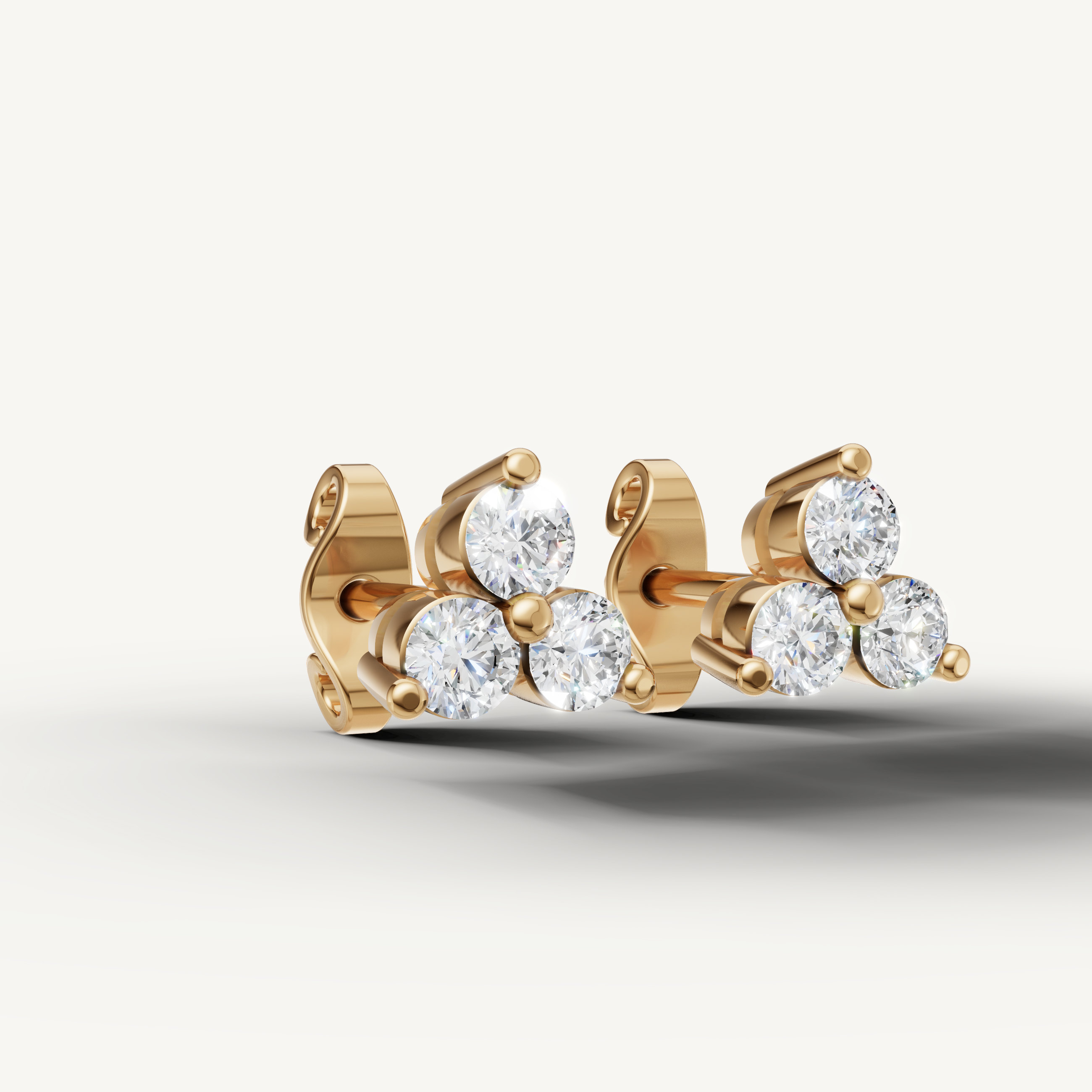 Luxury yellow gold triple diamond earrings minimalist fine jewelry Raul Diamonds