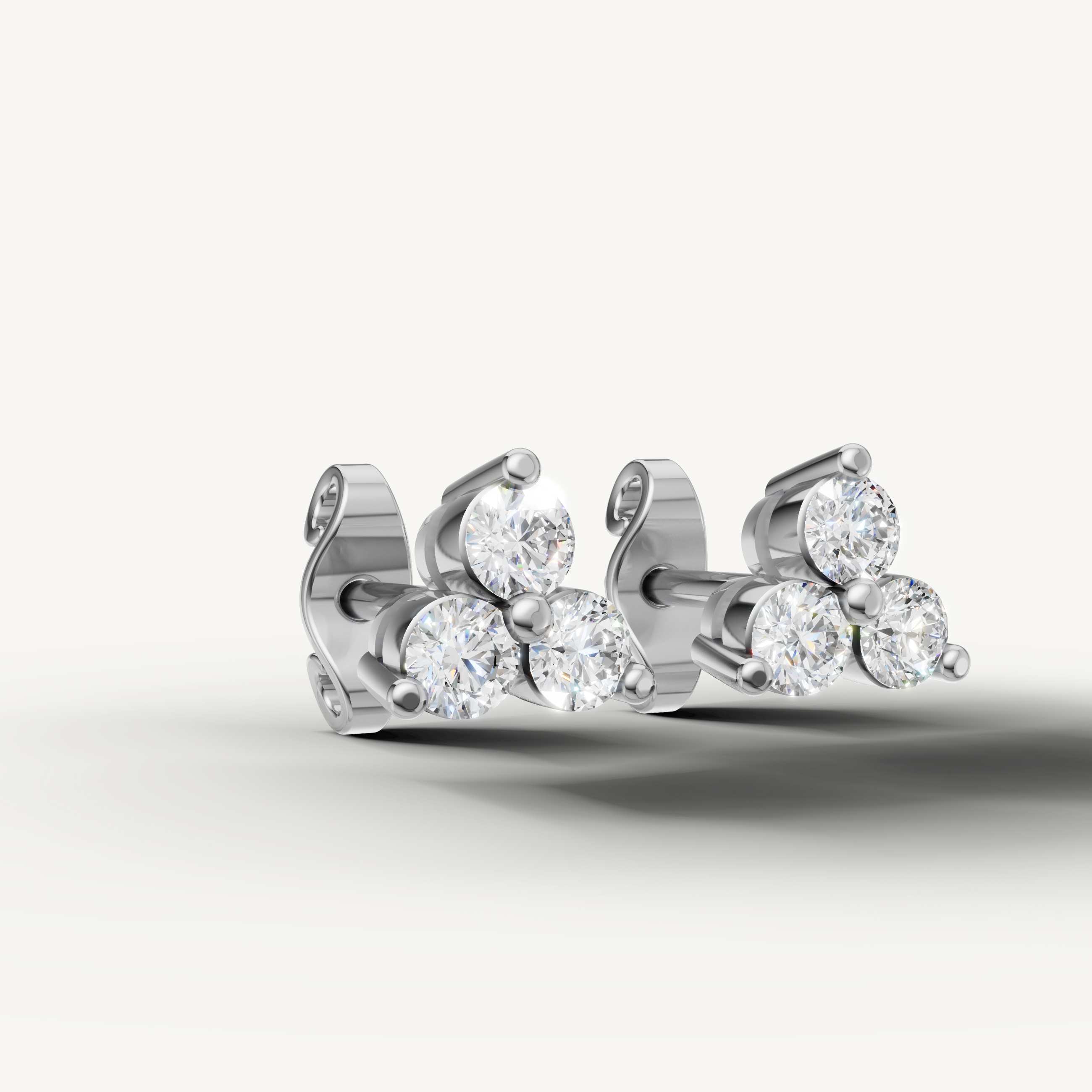 Elegant white gold floral diamond earrings handcrafted by Raul Diamonds