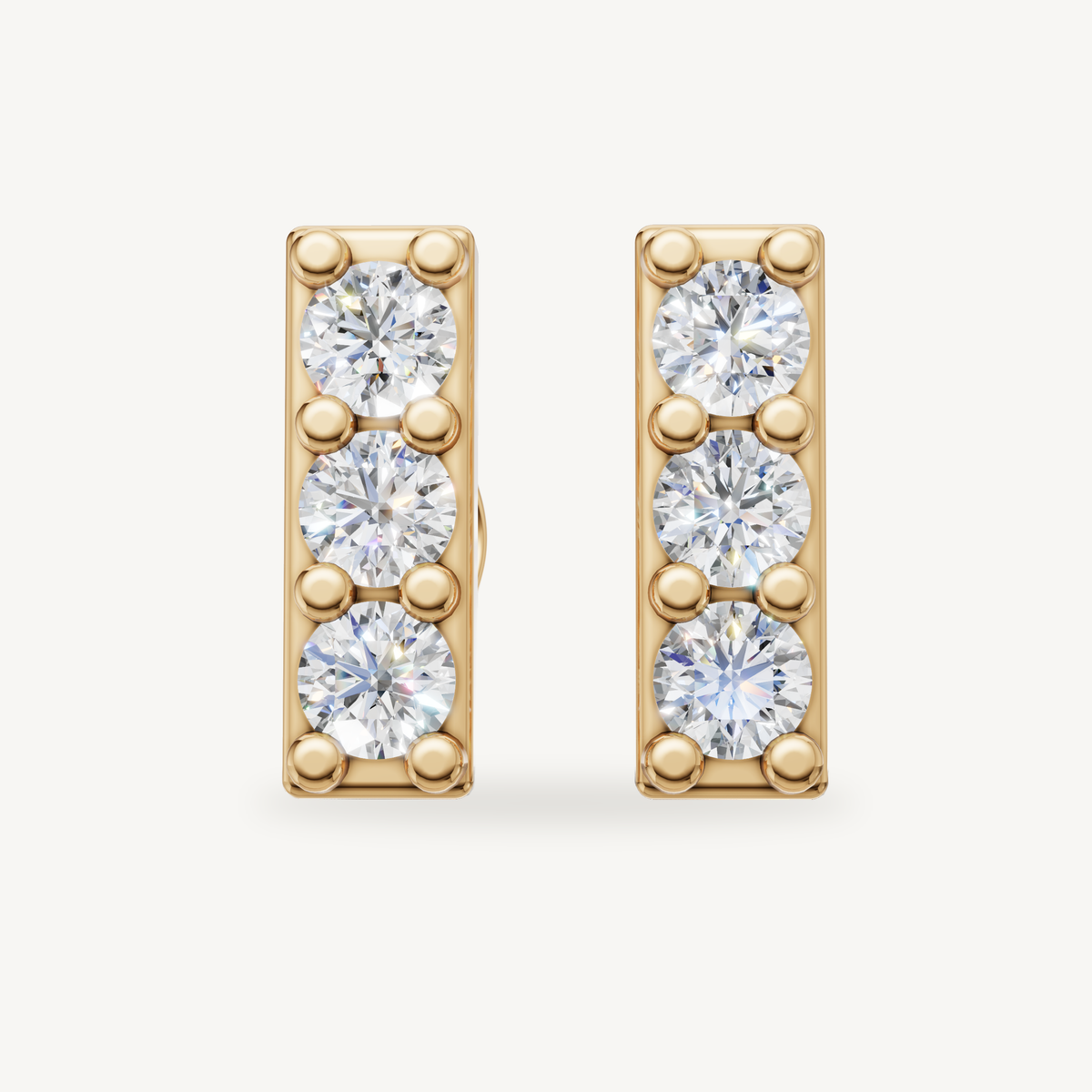Raul Diamonds yellow gold three stone diamond bar stud earrings for women