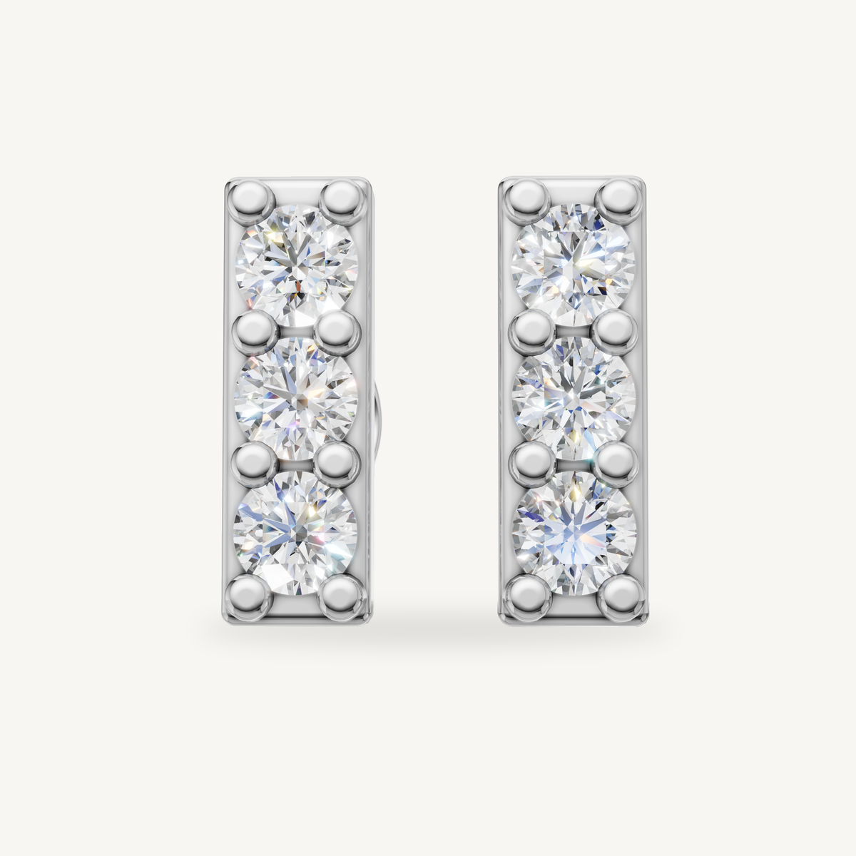 Raul Diamonds white gold three stone diamond bar earrings elegant fine jewelry