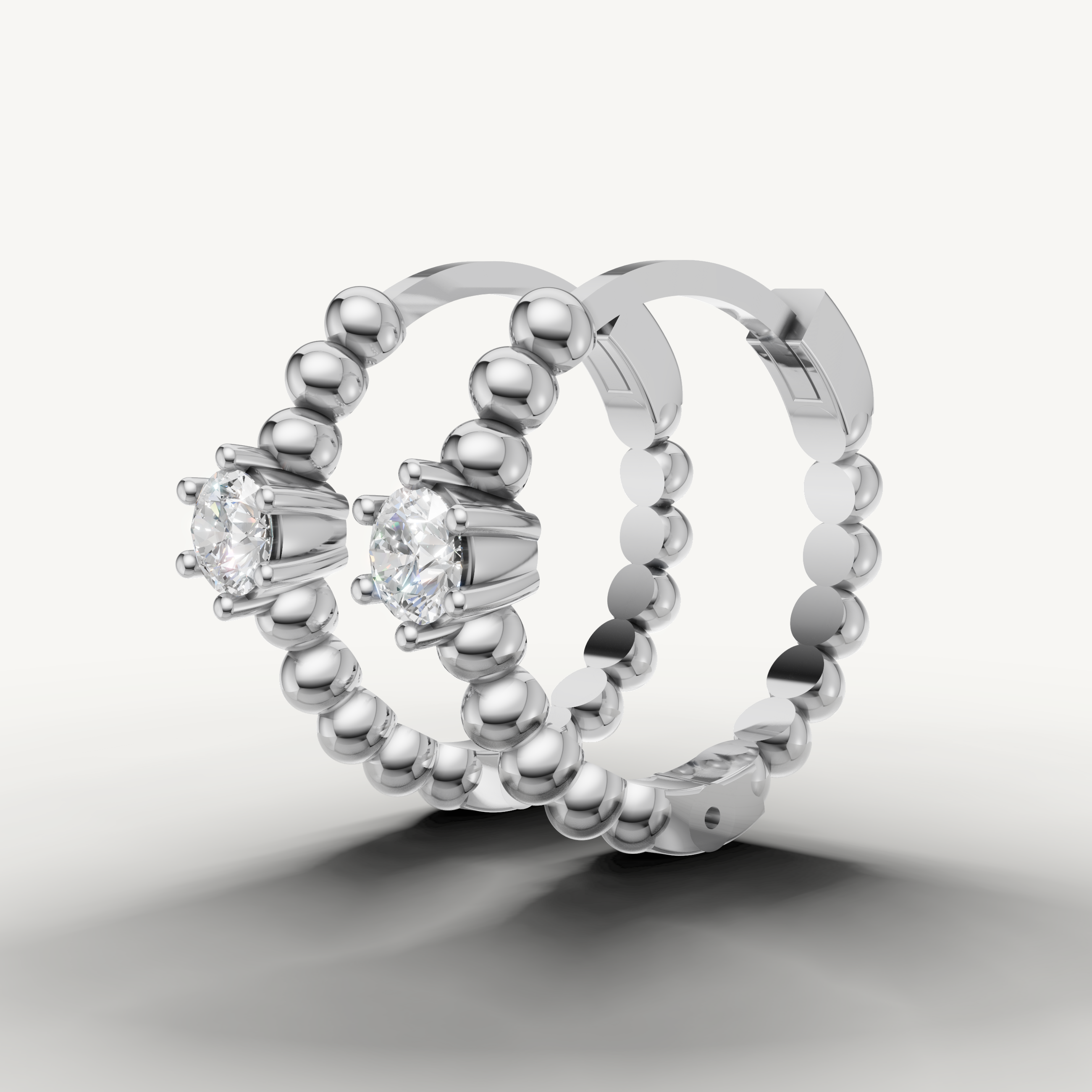 Modern white gold solitaire diamond hoop earrings Raul Diamonds