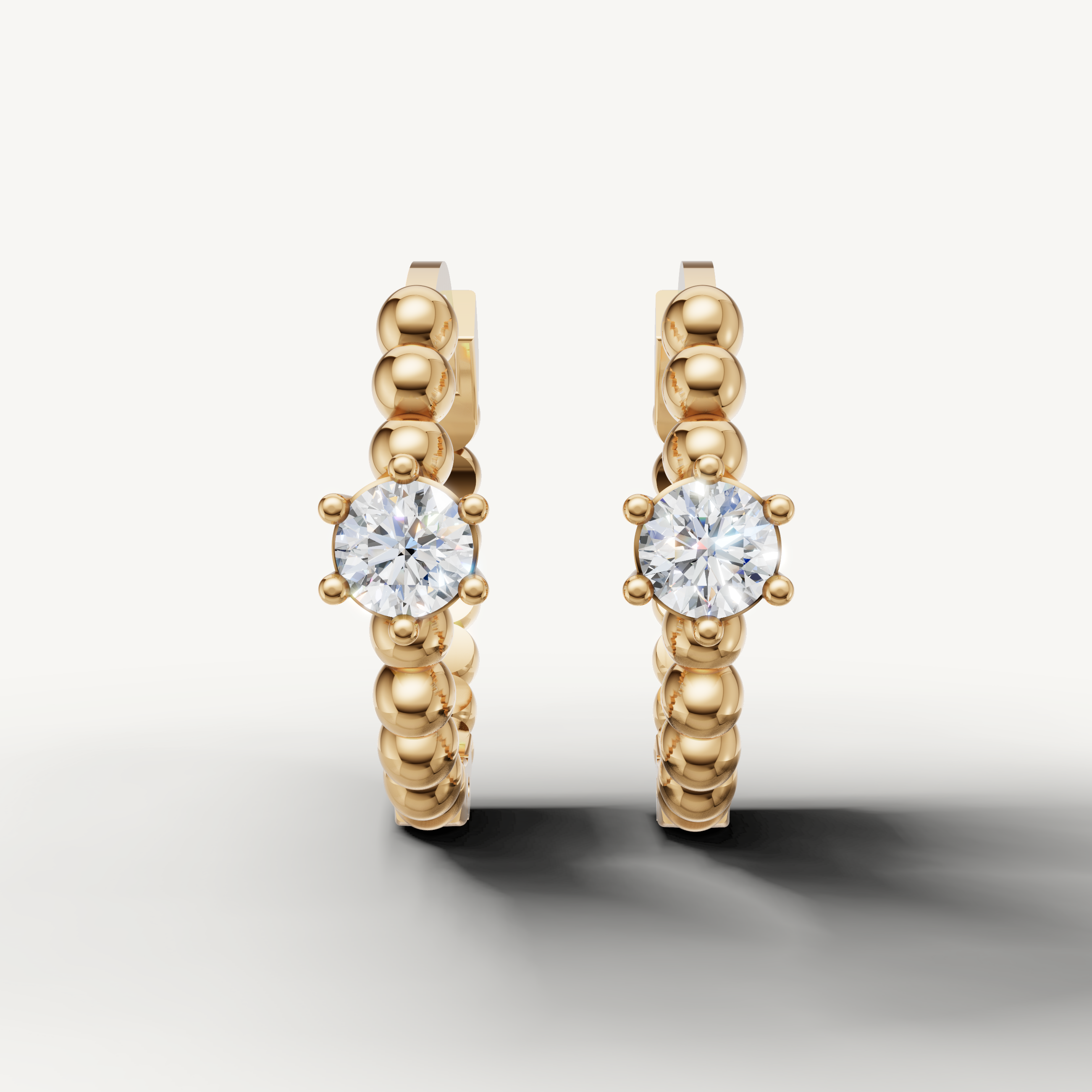 Raul Diamonds yellow gold beaded diamond hoop earrings for women