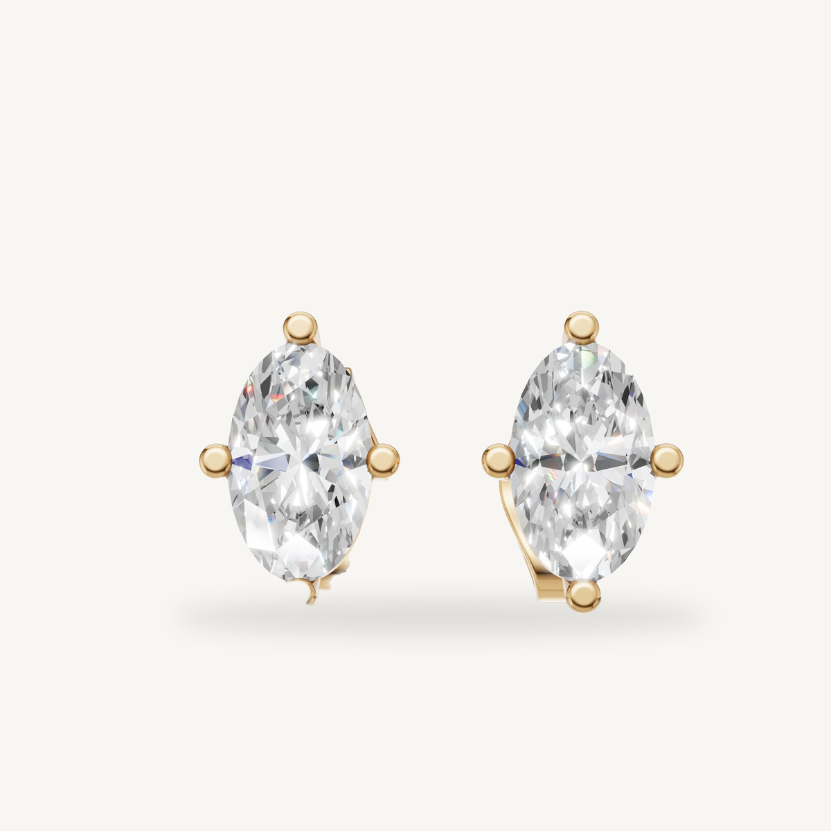 Raul Diamonds yellow gold marquise diamond stud earrings with elegant solitaire luxury design