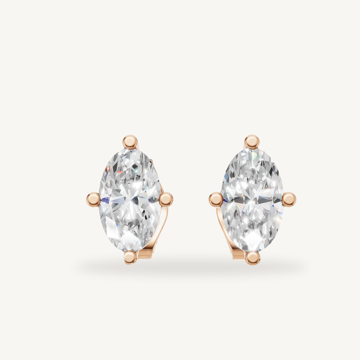Raul Diamonds rose gold marquise diamond stud earrings with classic solitaire fine jewelry styling