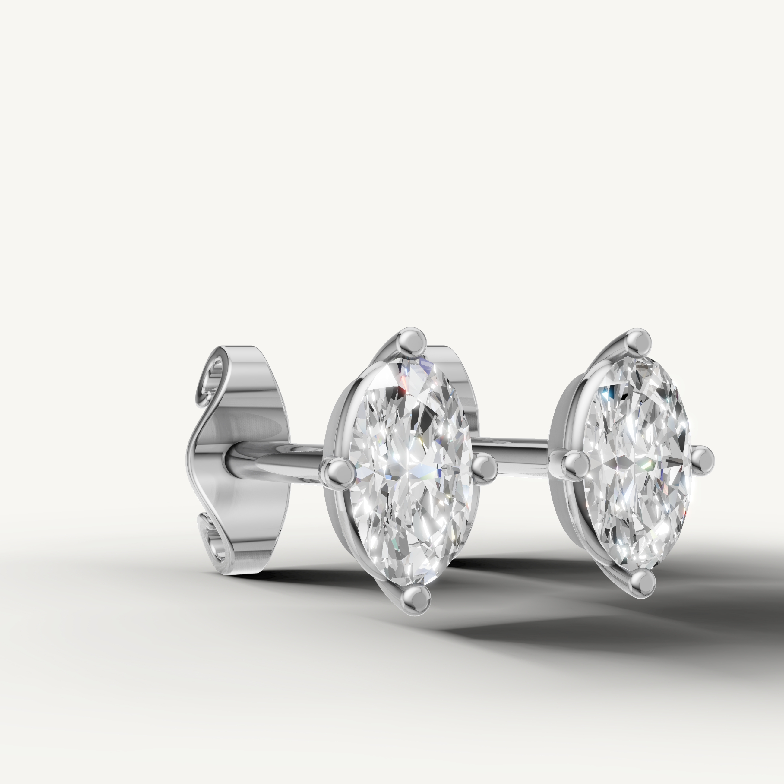 Luxury white gold solitaire stud earrings with marquise diamonds for women by Raul Diamonds