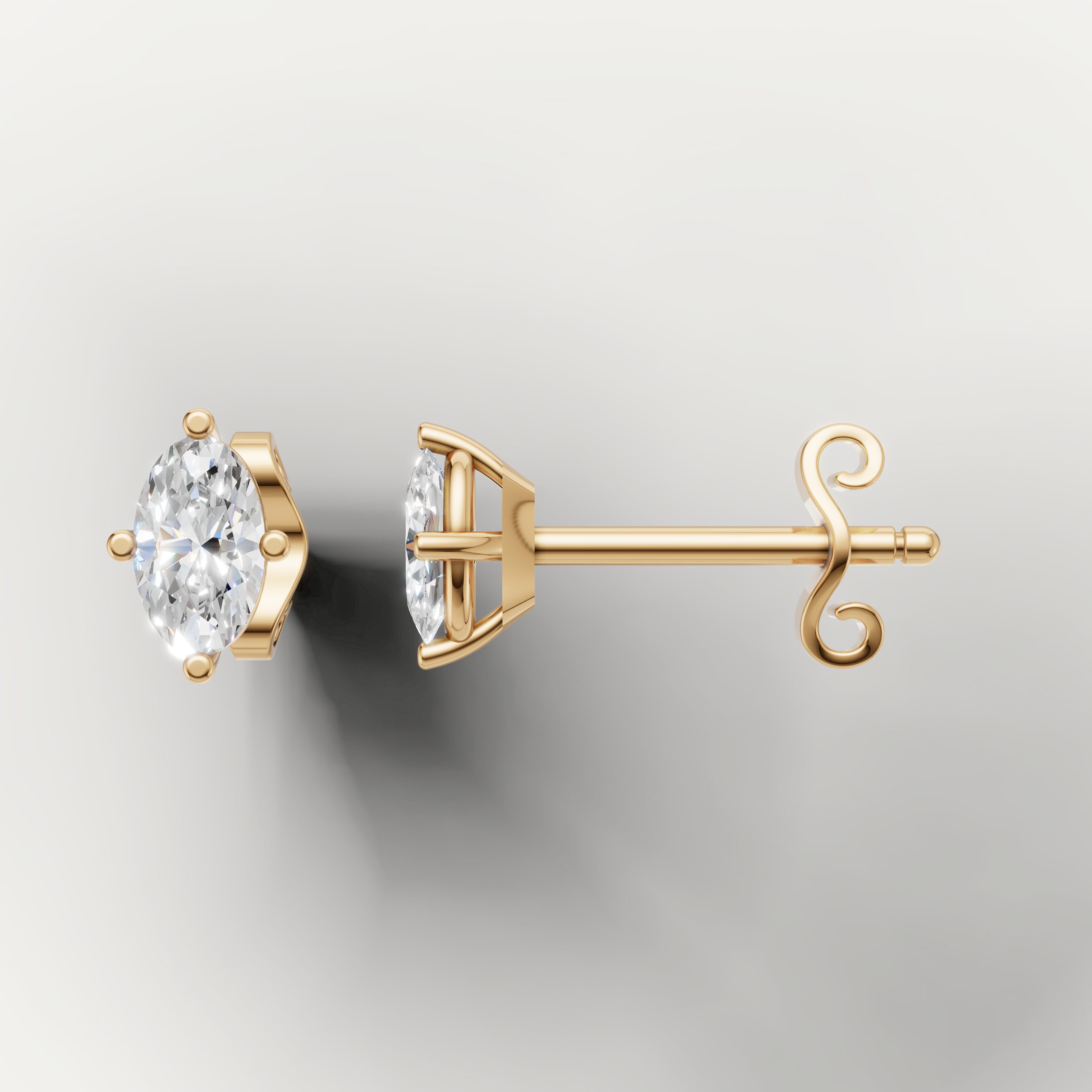Yellow gold marquise cut diamond earrings by Raul Diamonds featuring timeless minimalist craftsmanship