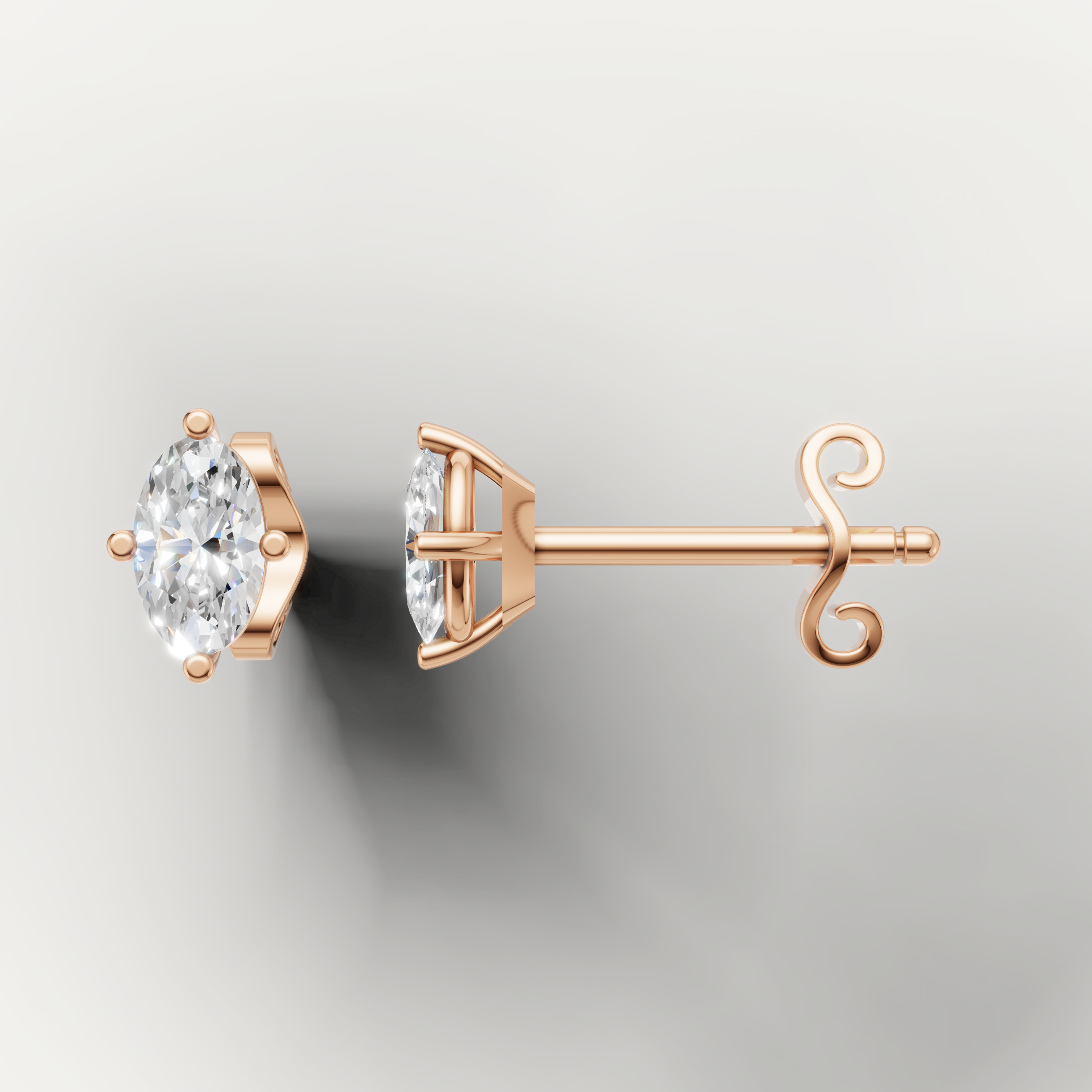 Rose gold marquise cut diamond earrings by Raul Diamonds featuring elegant luxury craftsmanship