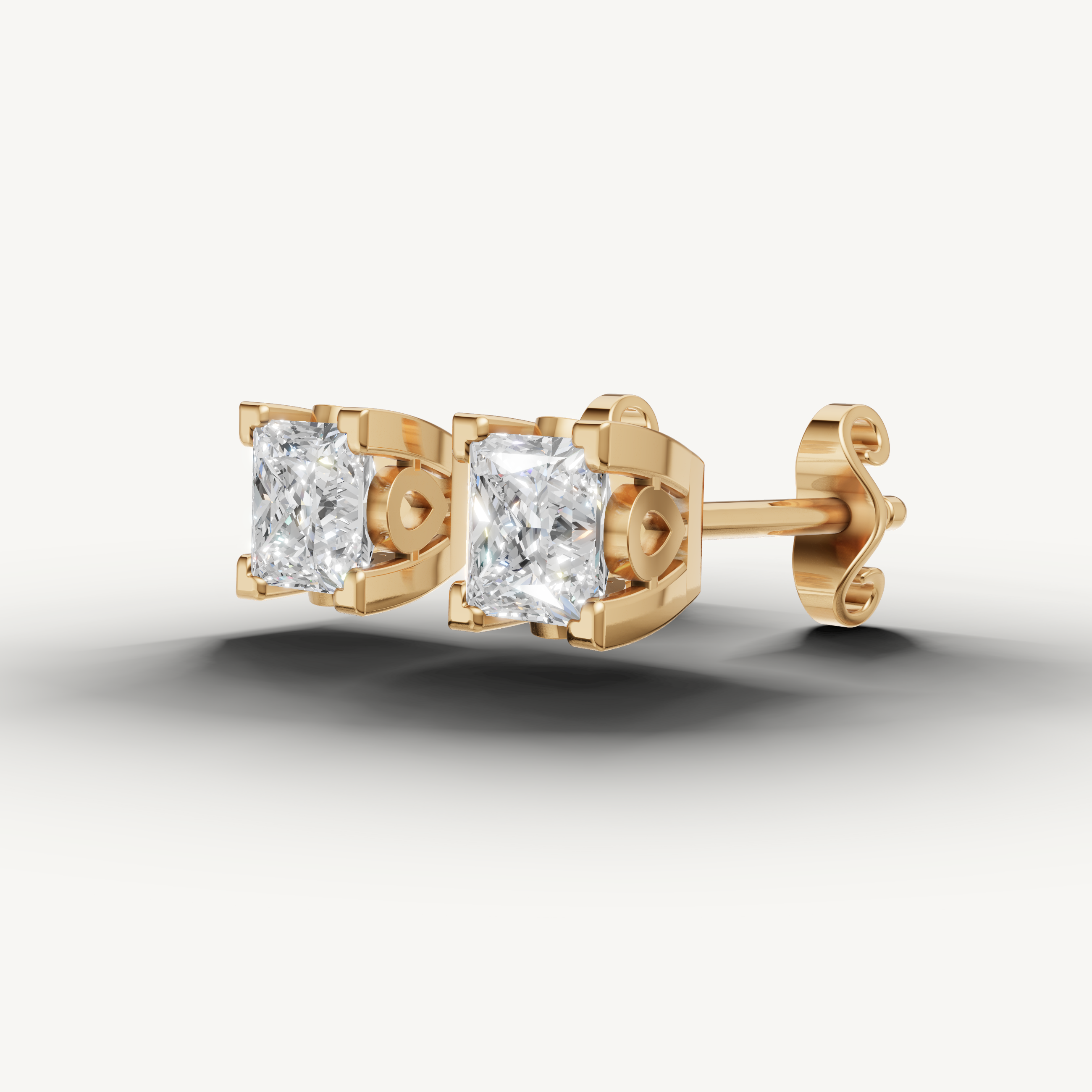 Raul Diamonds yellow gold solitaire stud earrings with sparkling princess cut diamonds and modern elegance