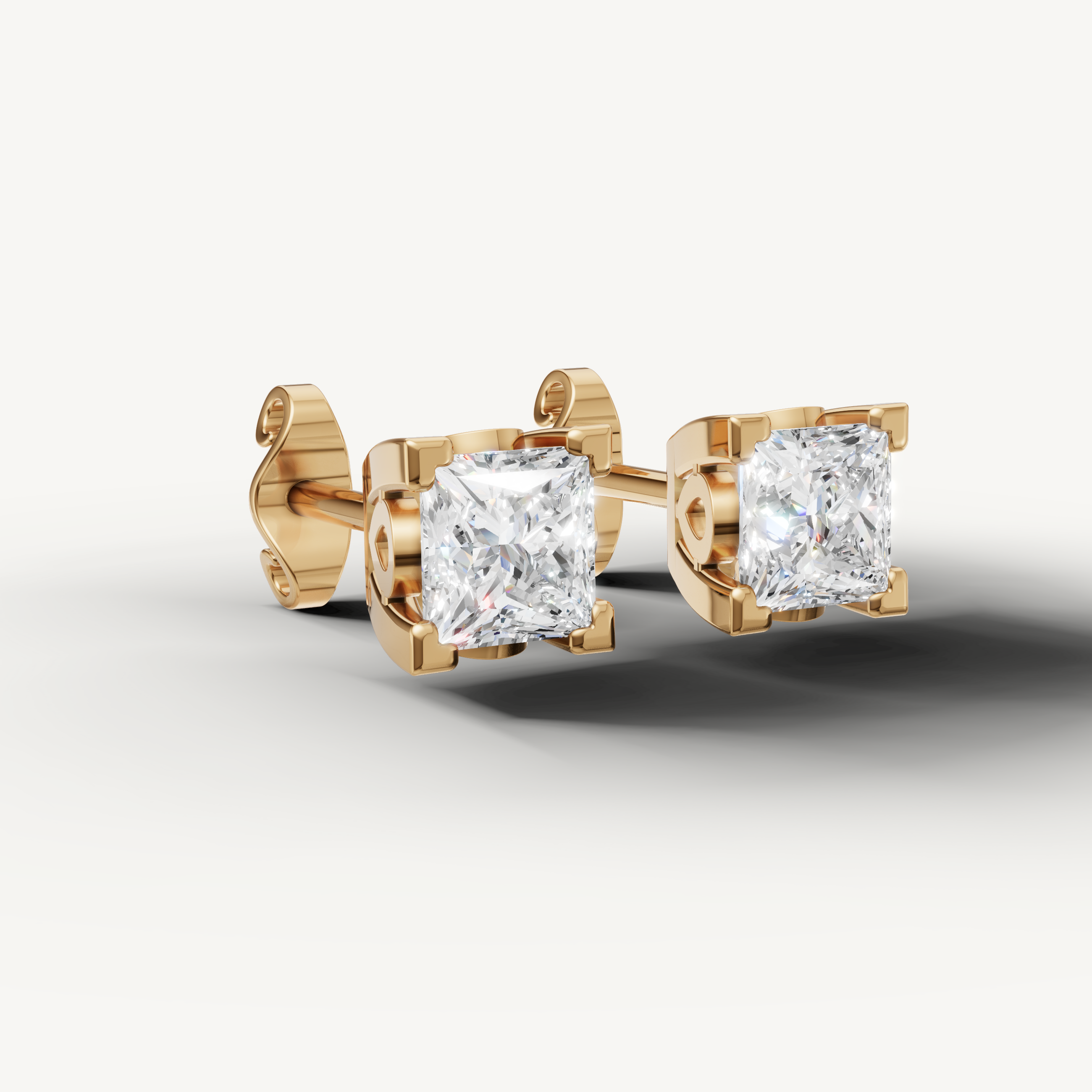 Luxury yellow gold princess diamond earrings for women with classic fine jewelry craftsmanship by Raul Diamonds