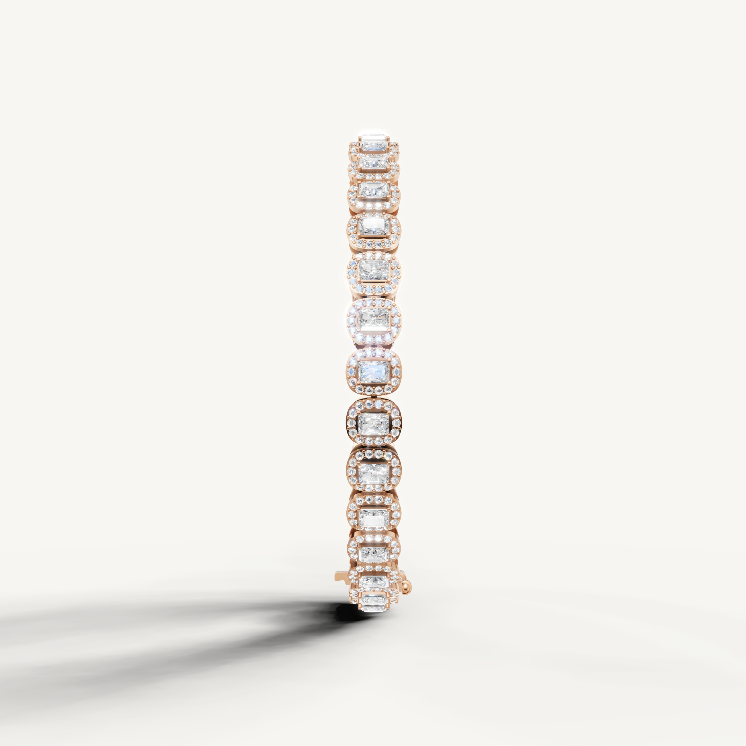Elegant rose gold diamond bracelet with emerald cut stones and luxury finish
