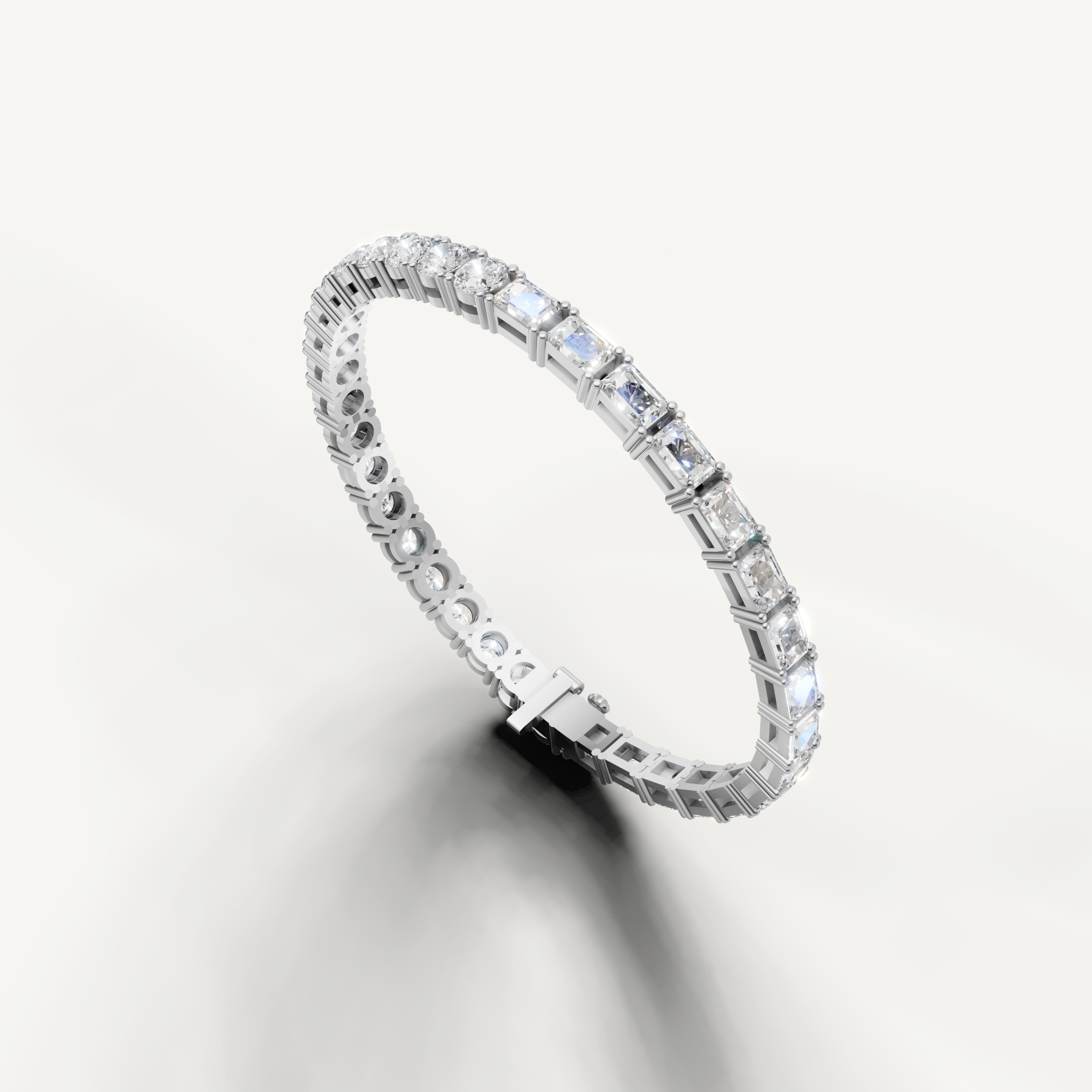 Designer white gold diamond bracelet with modern mixed cut stone arrangement