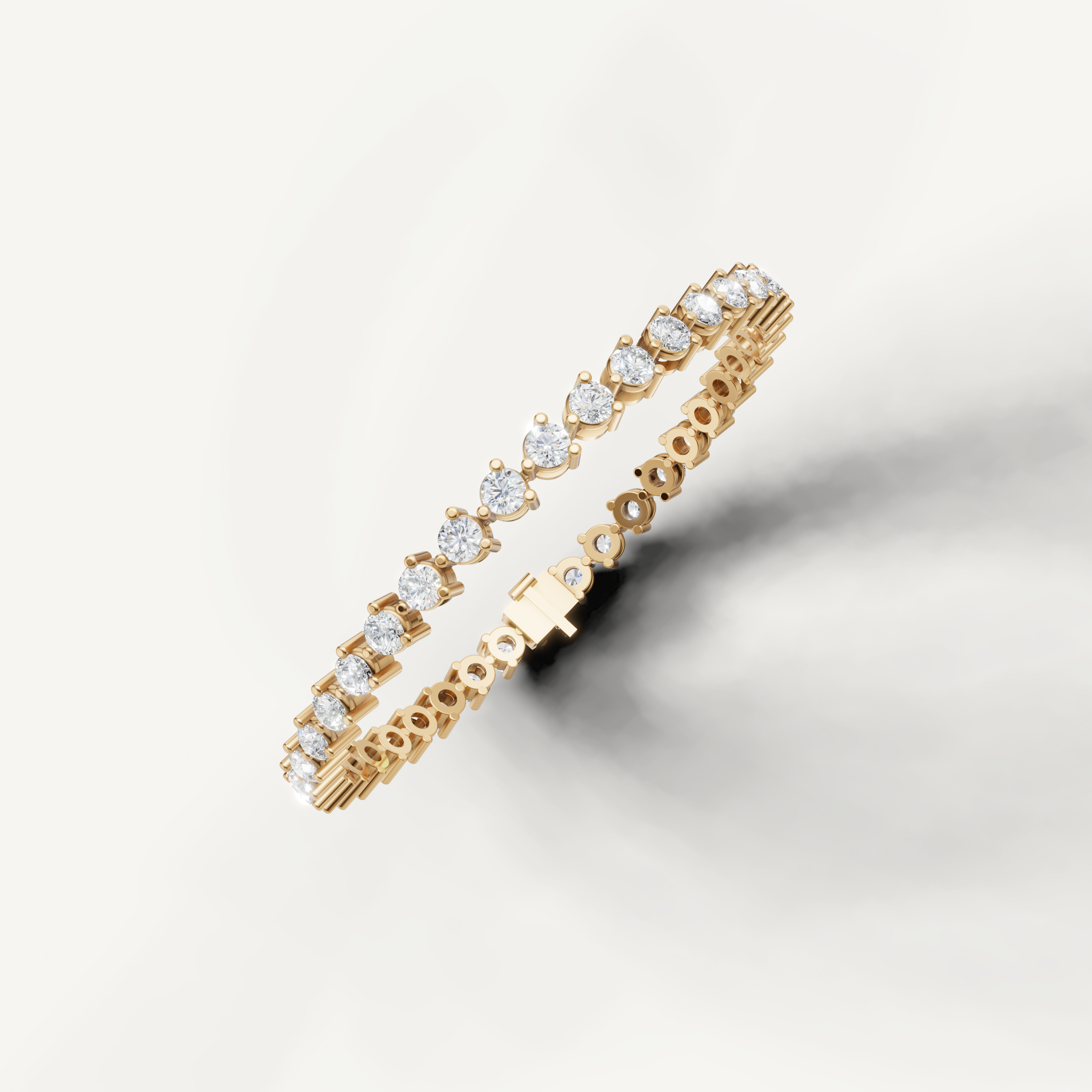 Elegant yellow gold diamond tennis bracelet featuring brilliant pear shape diamonds