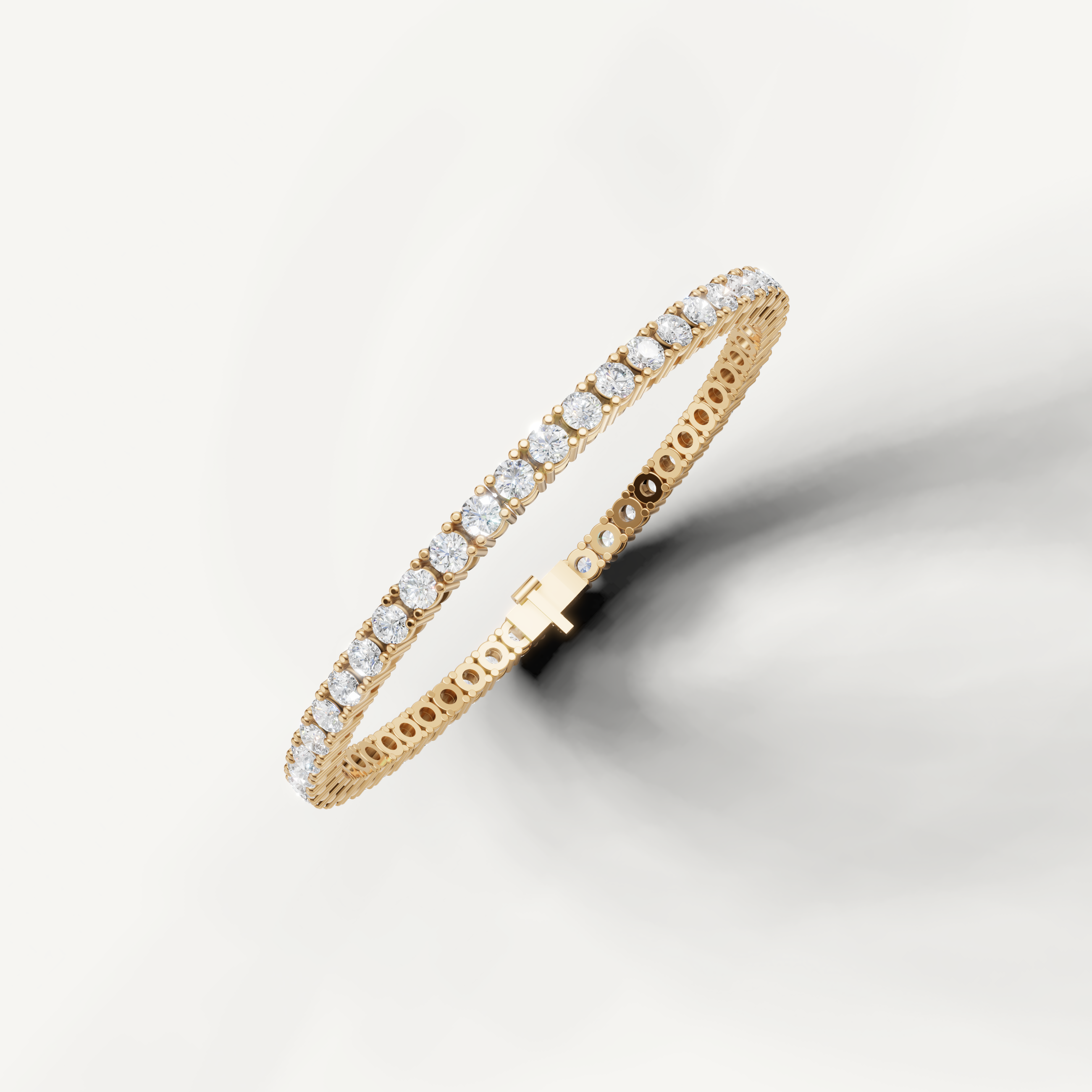 Fine yellow gold tennis bracelet with certified round diamonds by Raul Diamonds