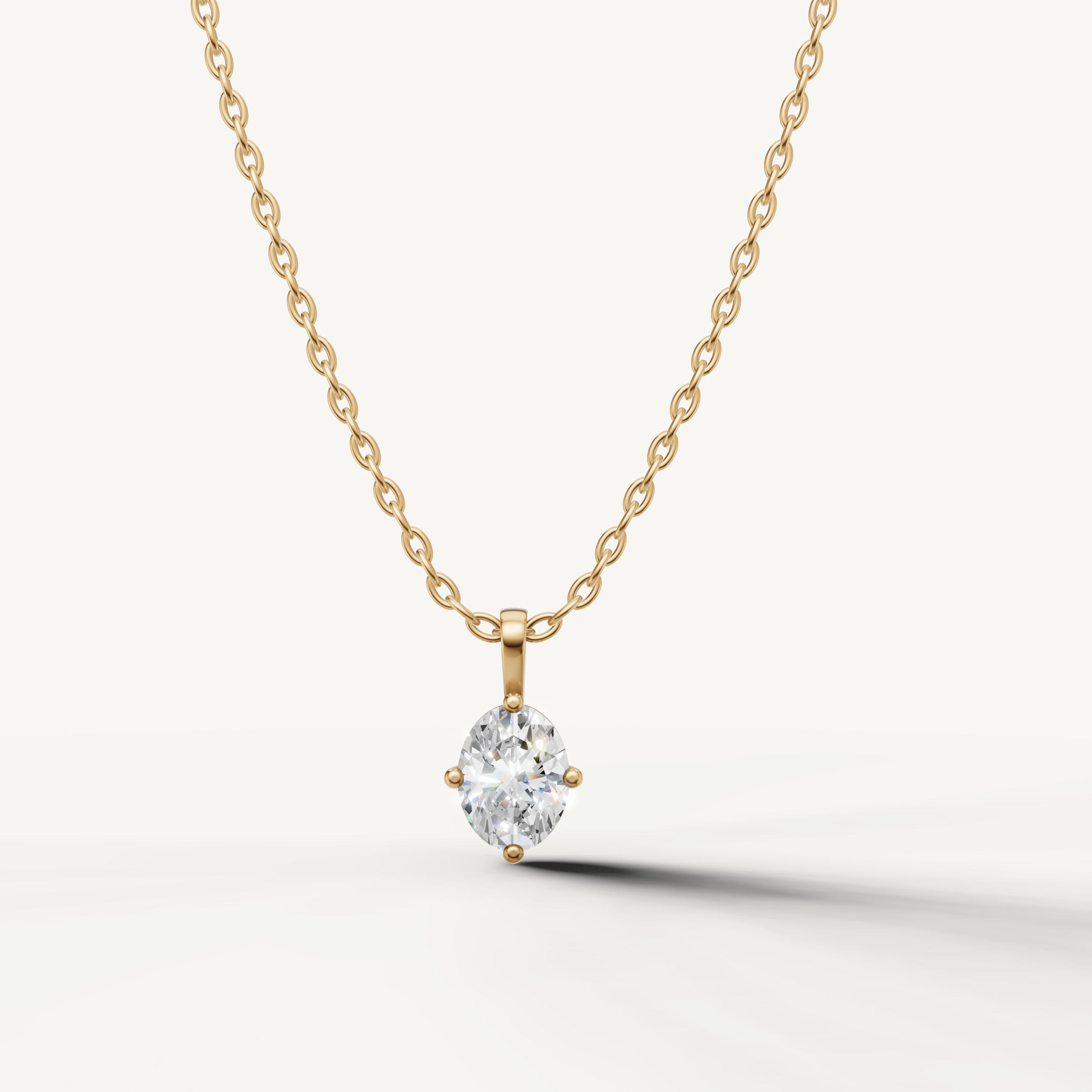Oval Lab Grown Diamond Solitaire Pendant Necklace in 14K Yellow Gold by Raul Diamonds