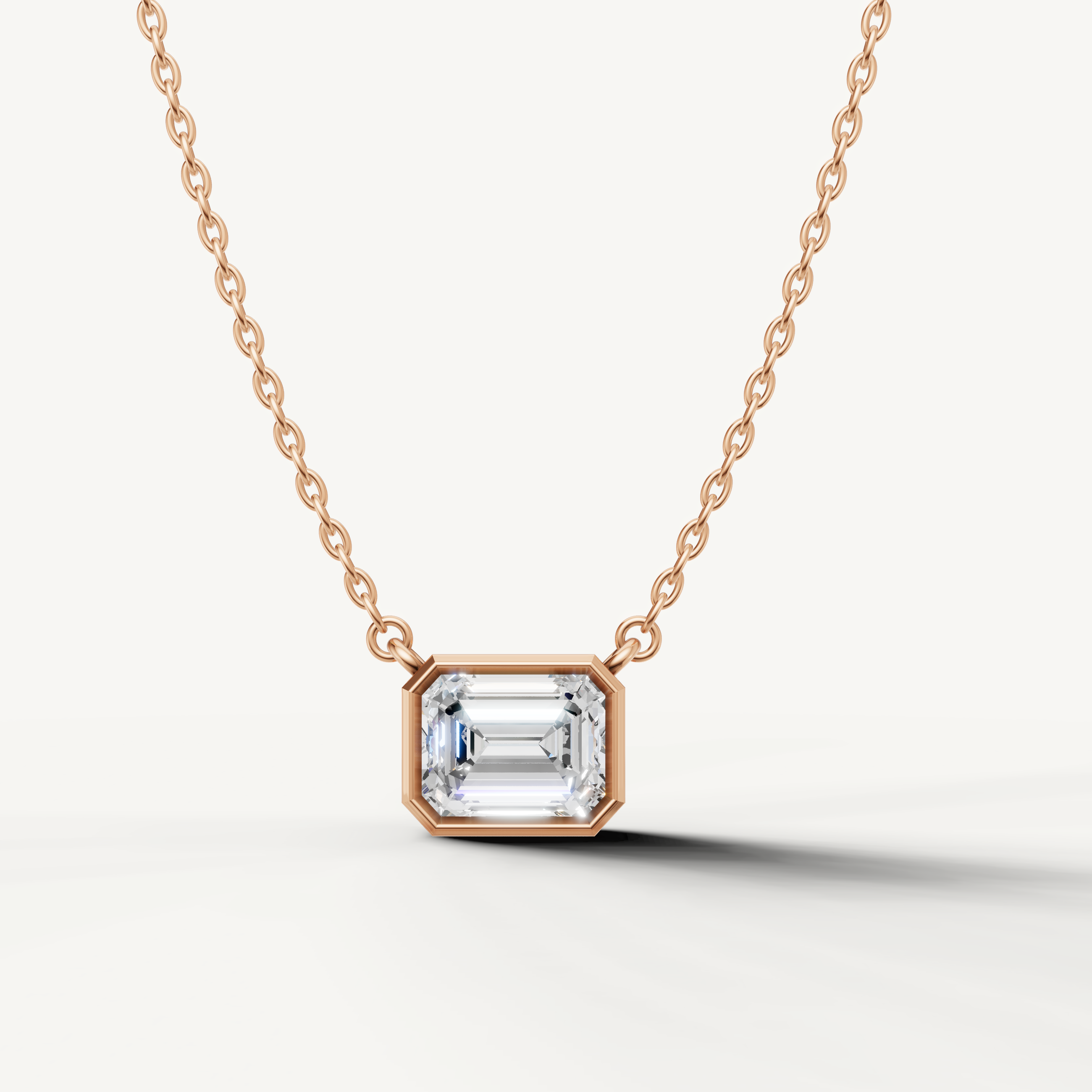 Emerald Cut Lab Grown Diamond Bezel Pendant Necklace in 14K Rose Gold by Raul Diamonds