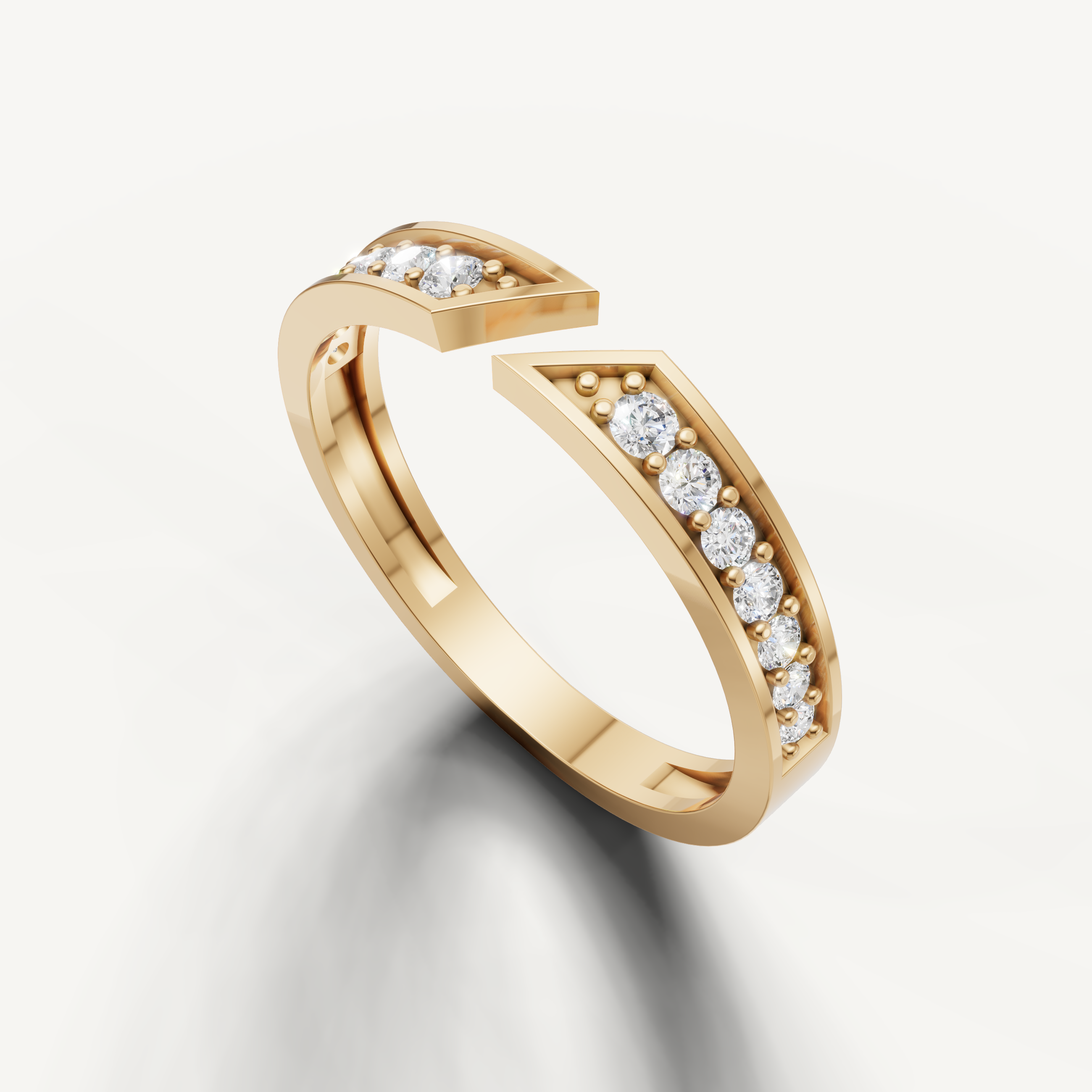 Yellow gold contemporary wedding band with pavé set round diamonds by Raul Diamonds
