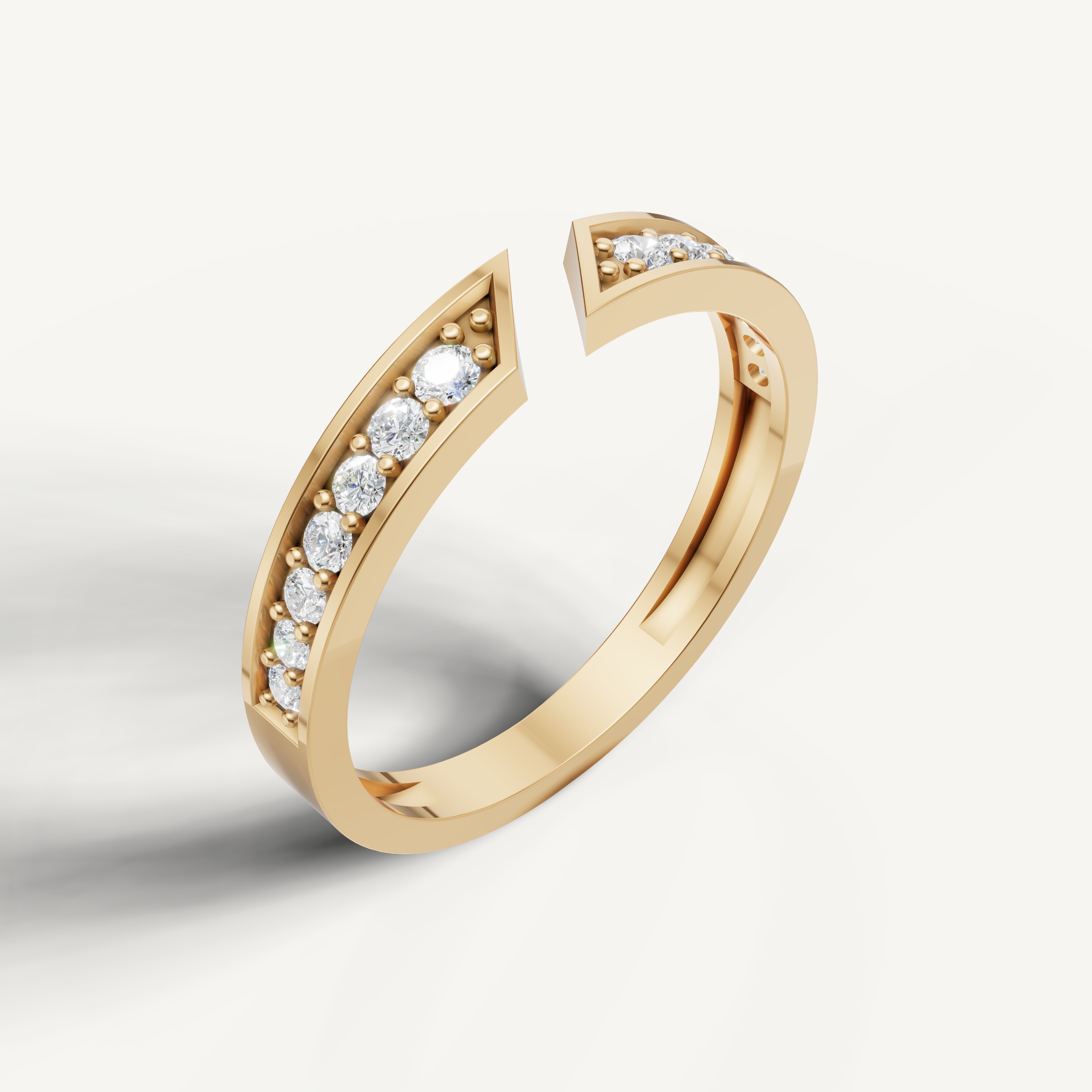 Elegant yellow gold diamond wedding ring with split V shape and round brilliant diamonds