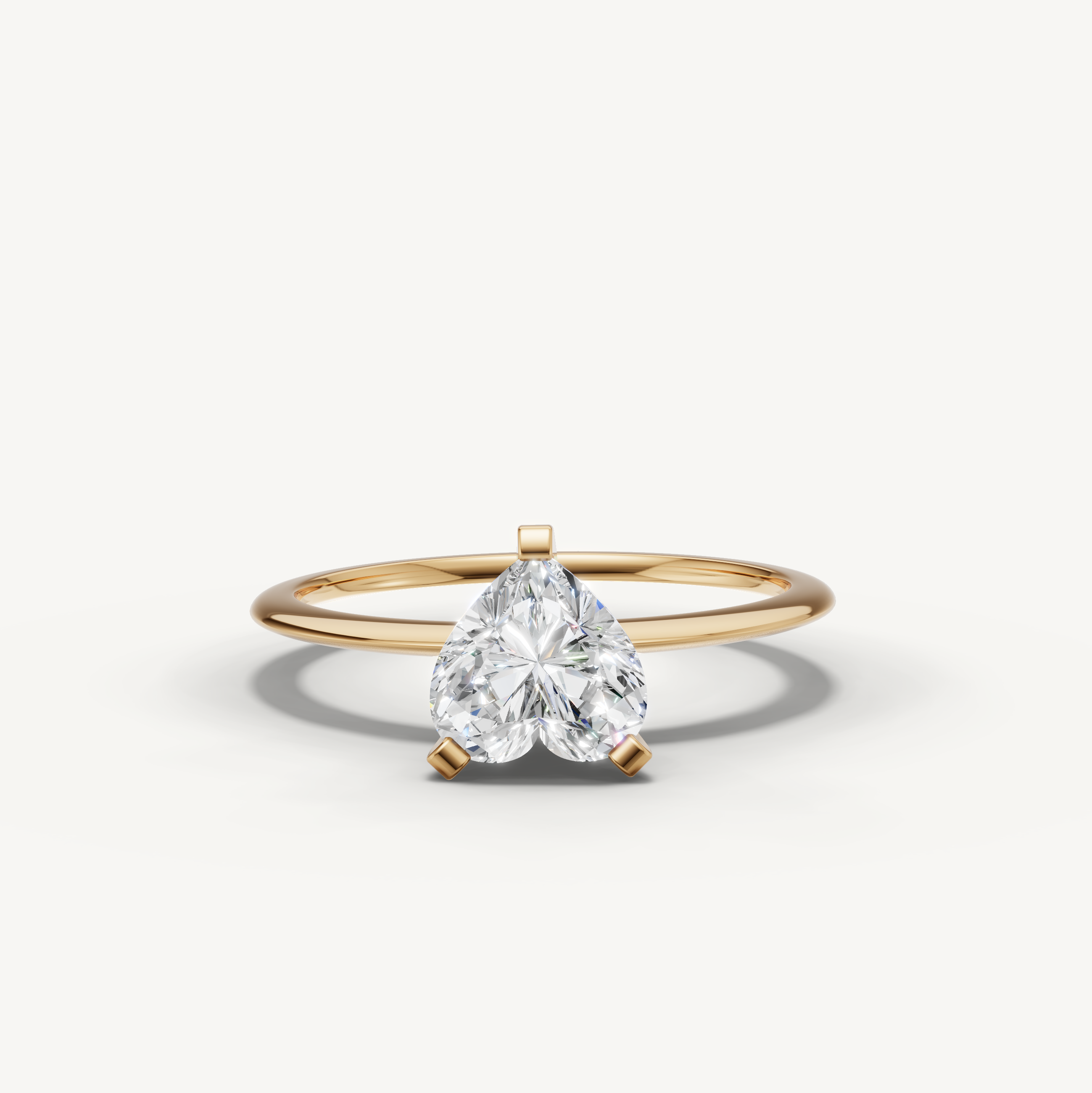 Heart cut lab grown diamond solitaire engagement ring in yellow gold by Raul Diamonds