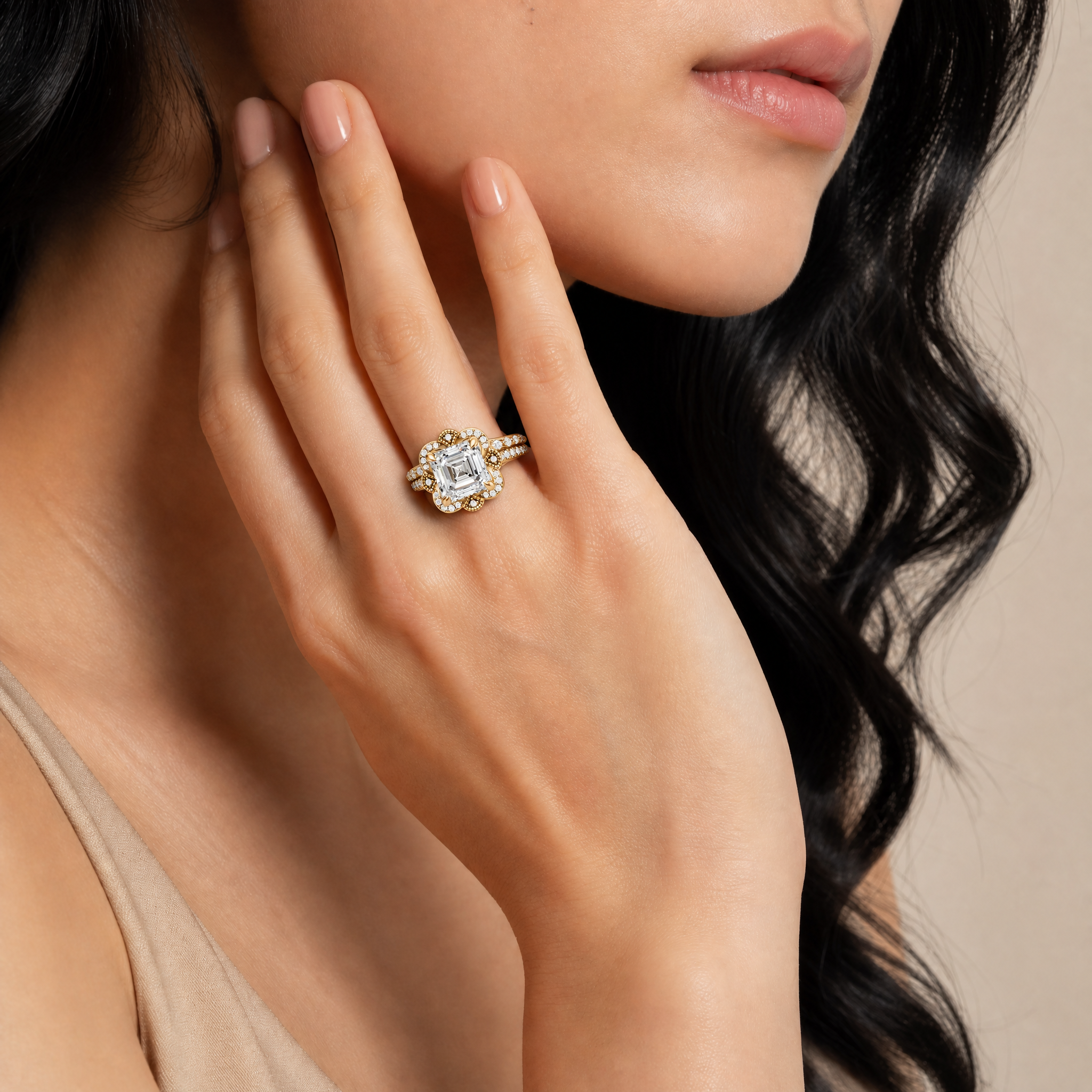 Female Model Wearing Asscher Cut Lab Grown Diamond Floral Halo Bridal Set by Raul Diamonds