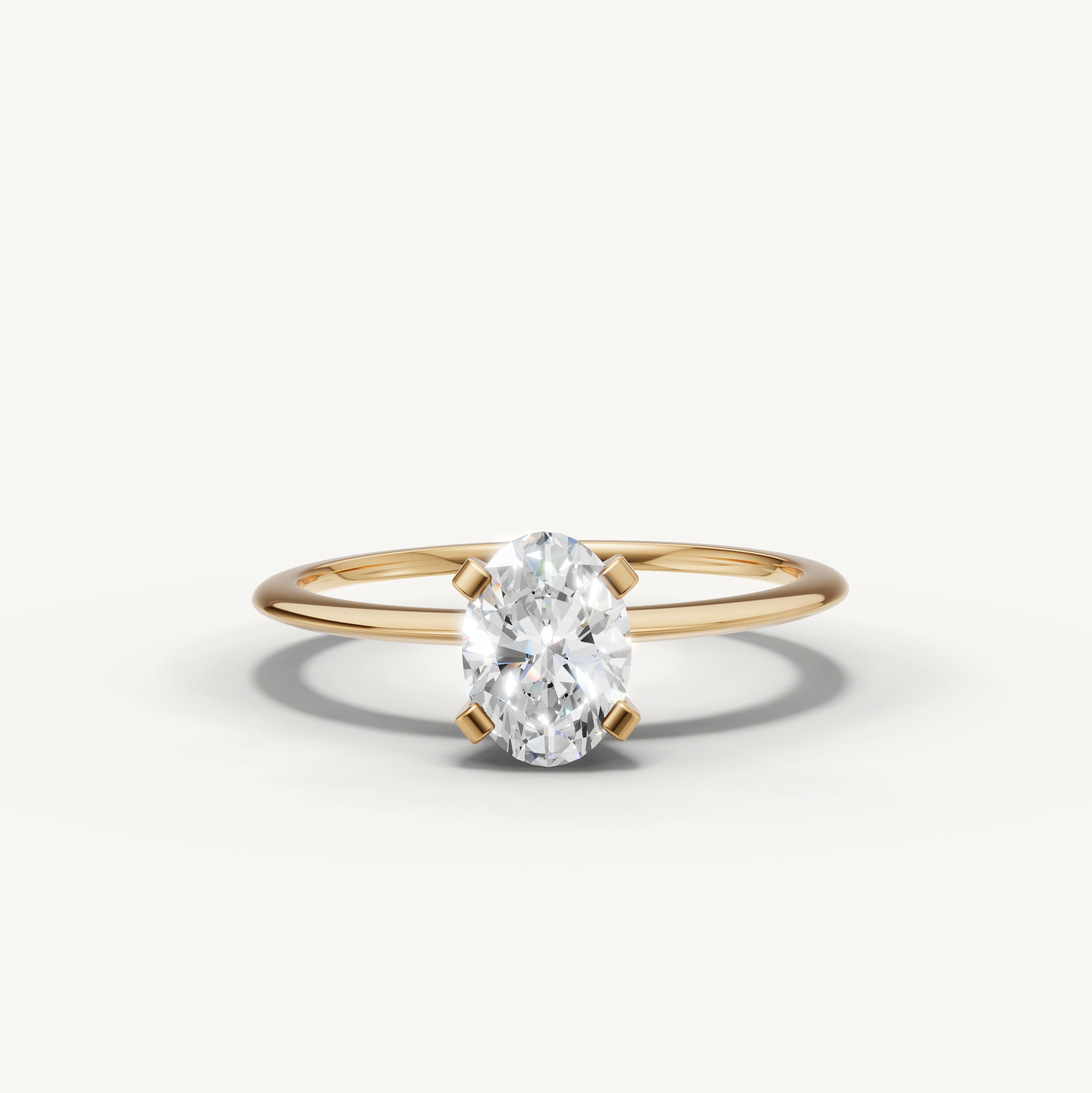 Oval cut lab grown diamond solitaire engagement ring in yellow gold by Raul Diamonds