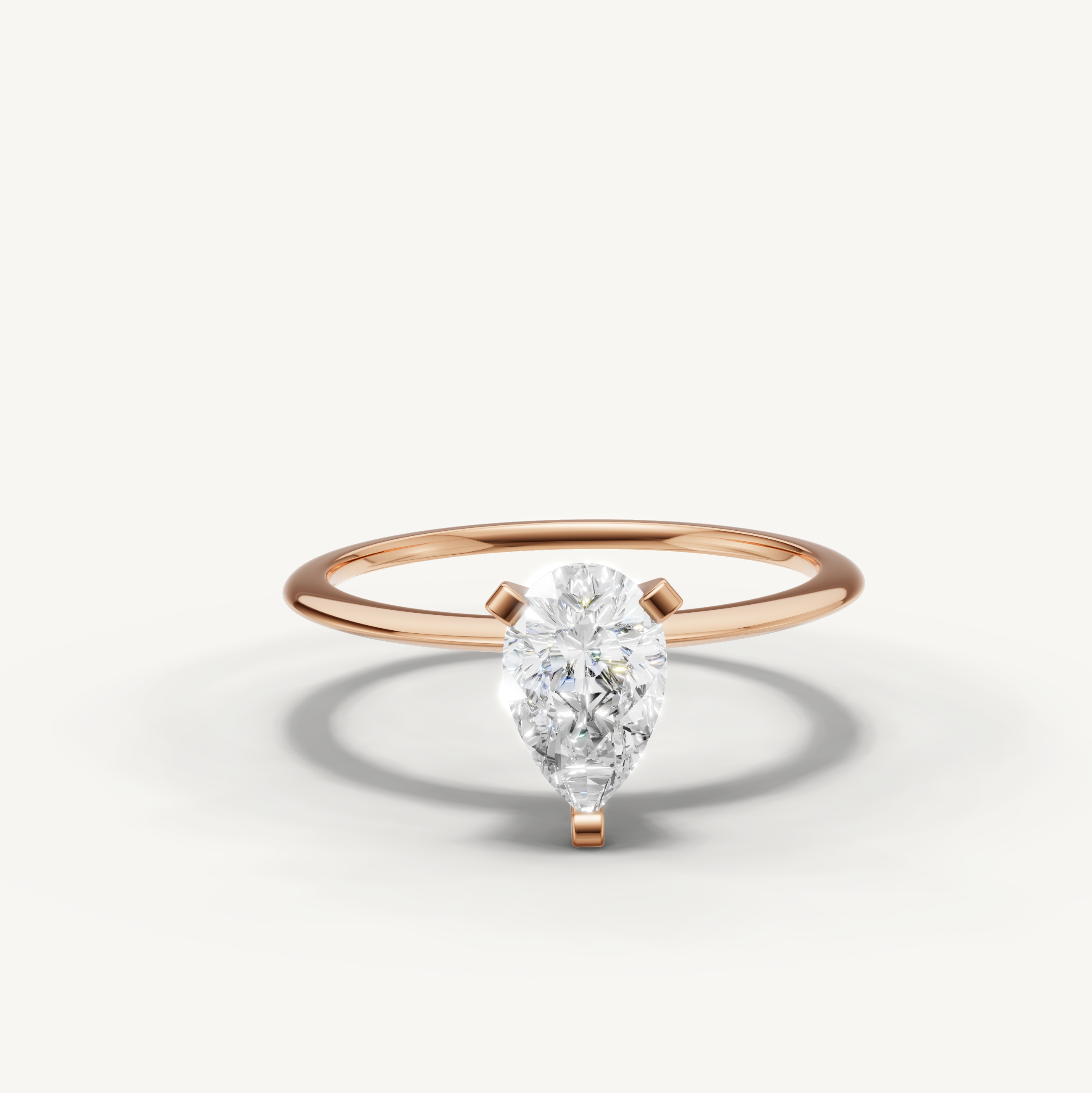 Pear cut lab grown diamond solitaire engagement ring in rose gold by Raul Diamonds