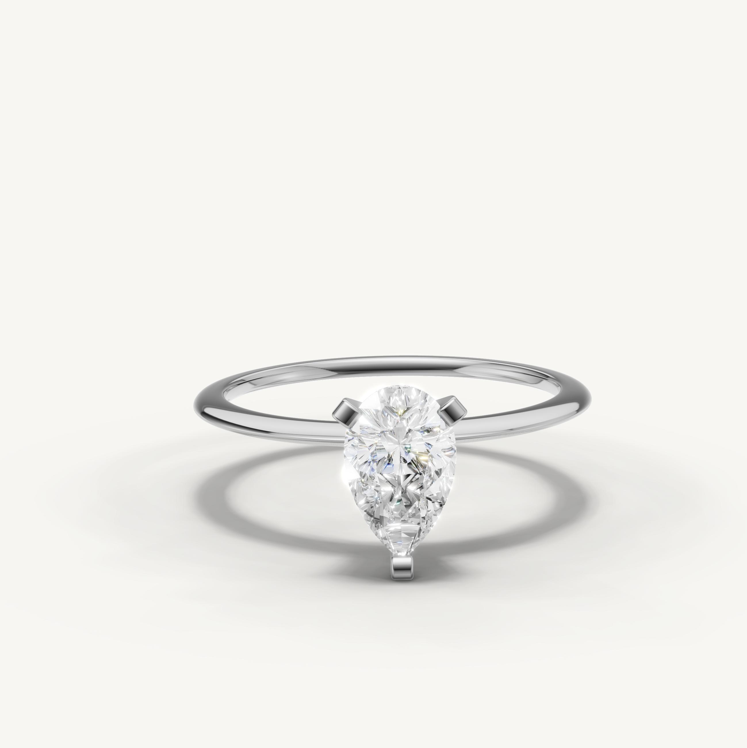 Pear cut lab grown diamond solitaire engagement ring in white gold by Raul Diamonds